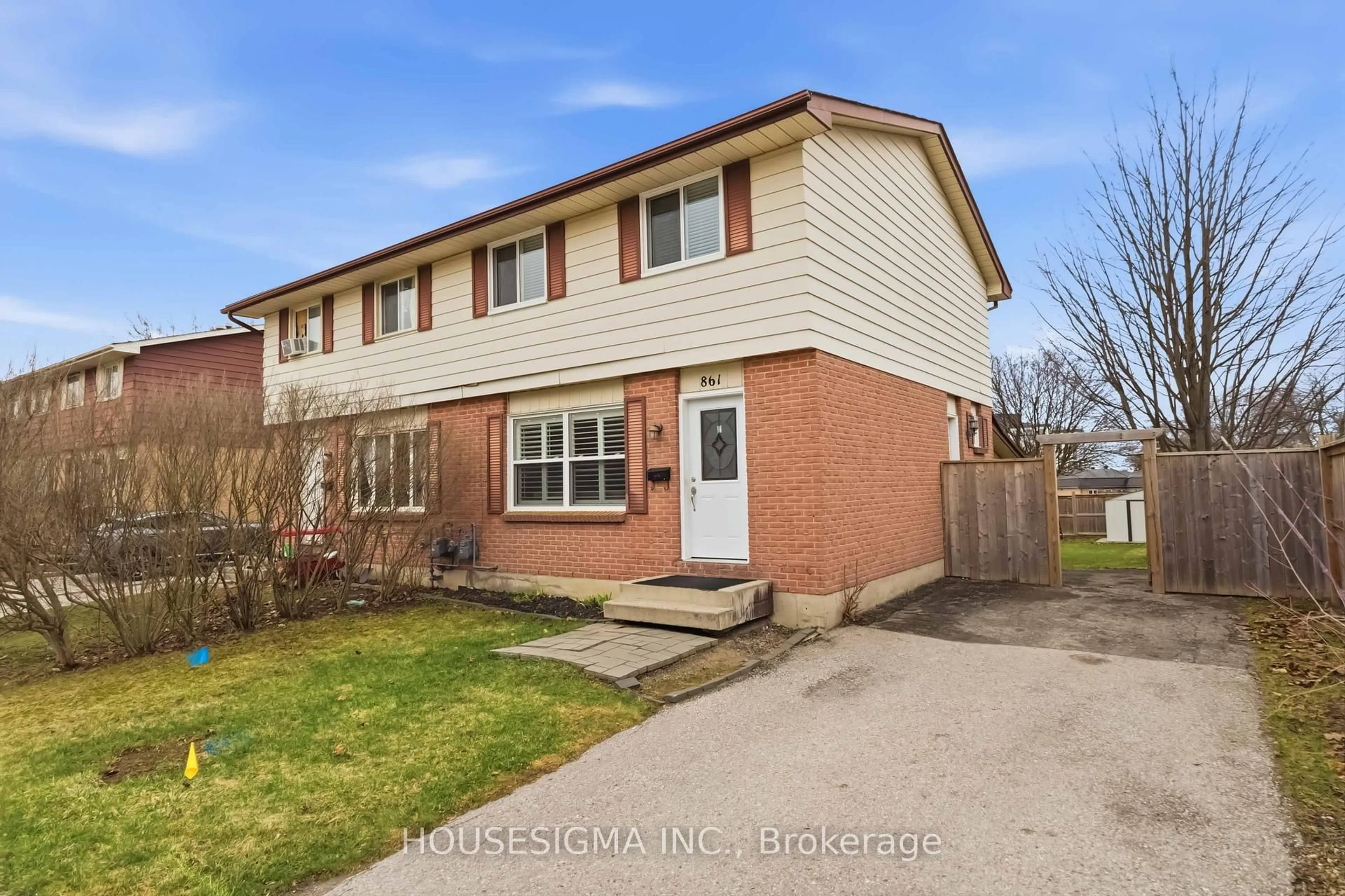 Home with brick exterior material, street for 861 DEARNESS Dr, London South Ontario N6E 1Y4