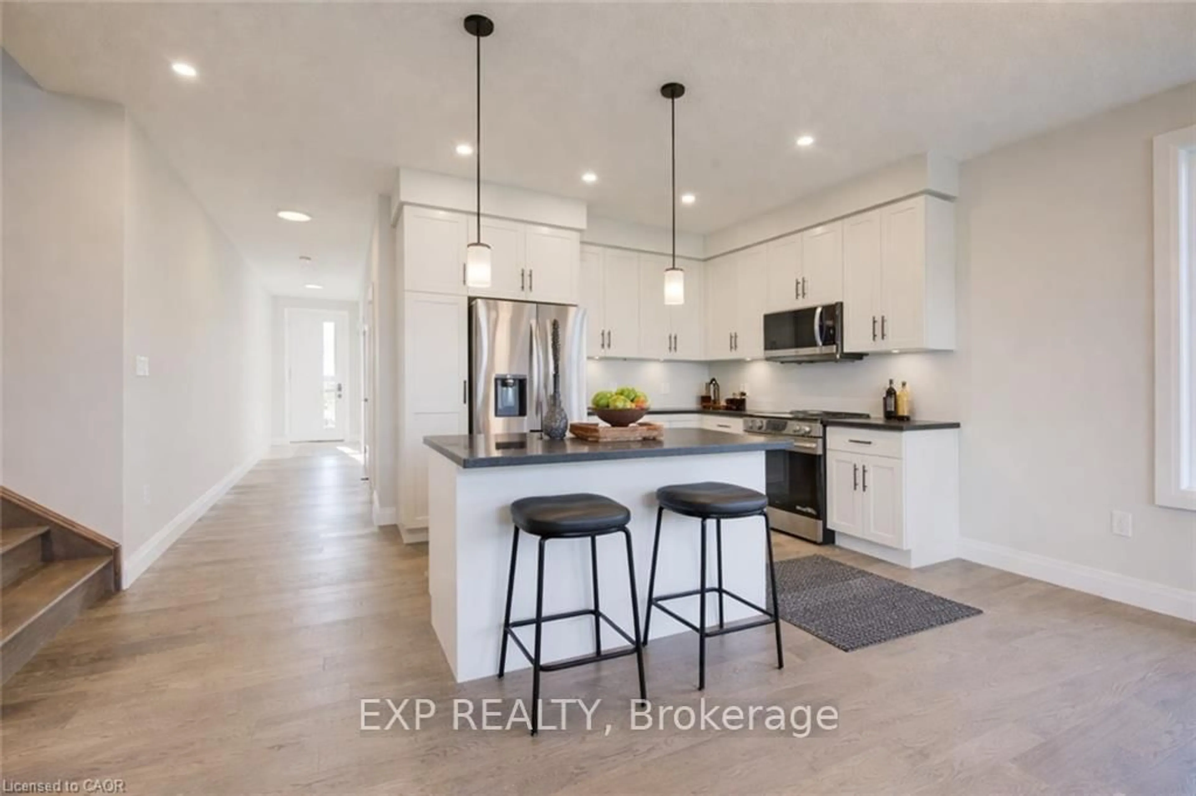 Open concept kitchen, ceramic/tile floor for 113 Bean St, Minto Ontario N0G 1Z0