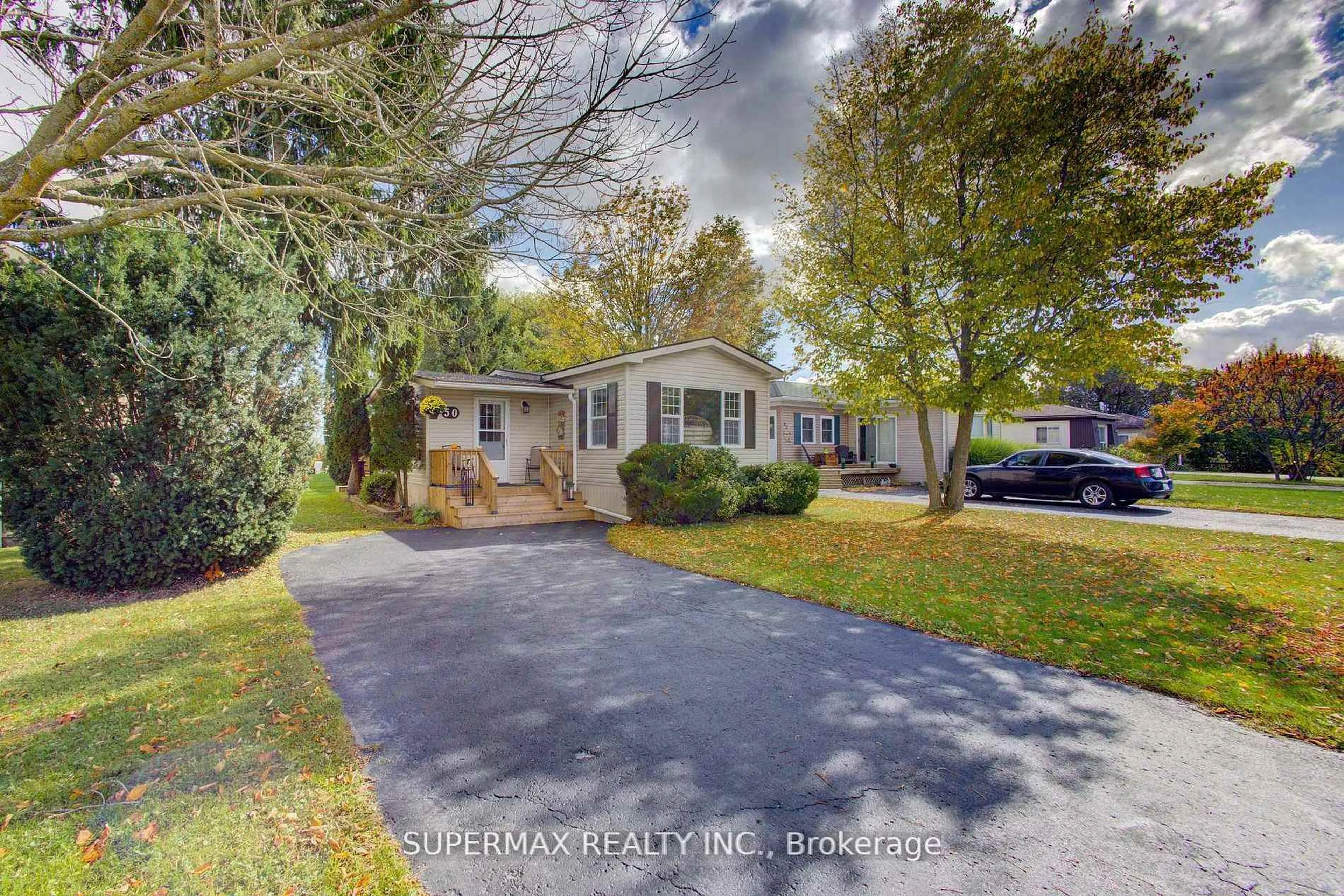 A pic from outside/outdoor area/front of a property/back of a property/a pic from drone, street for 302694 Douglas St #50, West Grey Ontario N0G 1R0