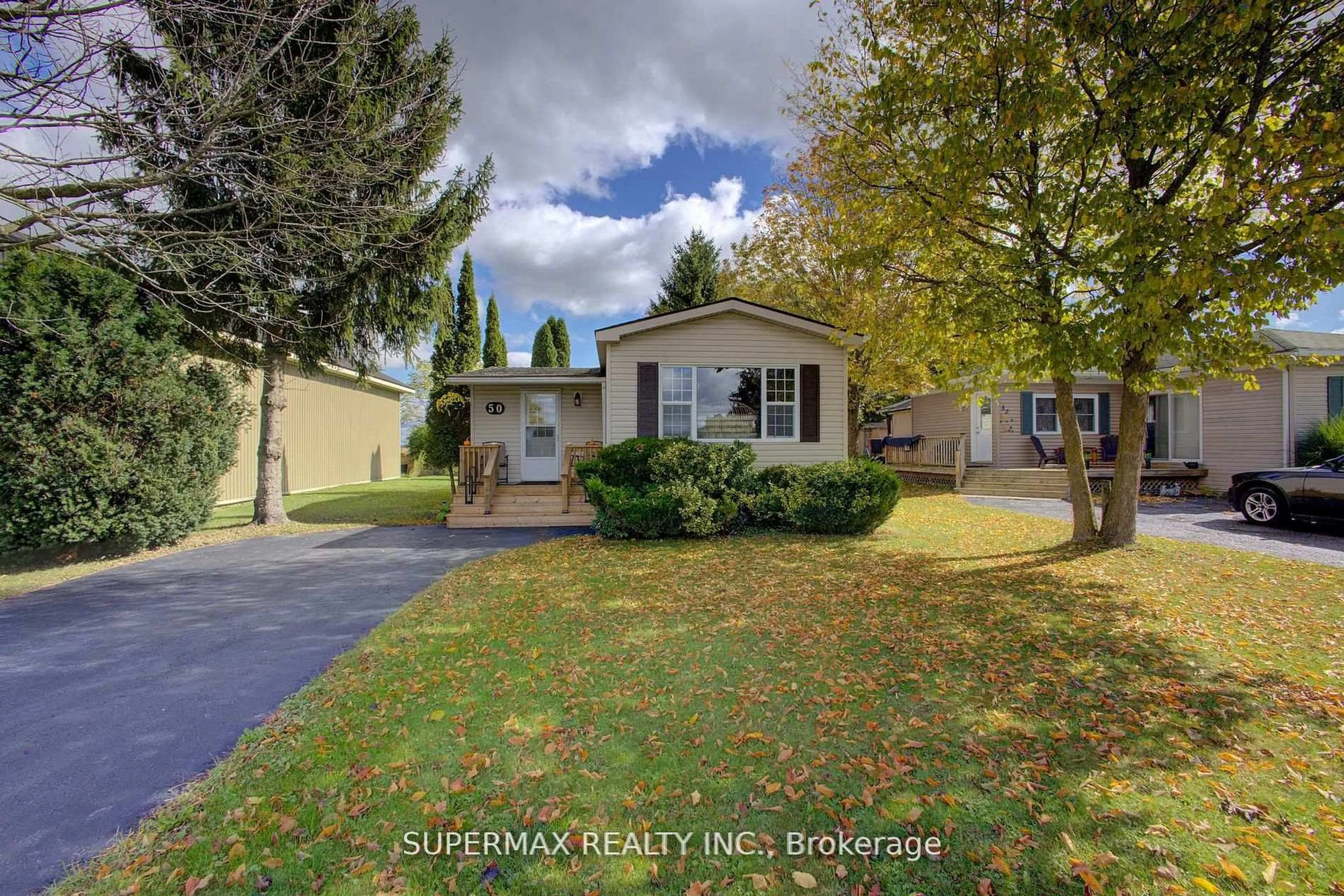 A pic from outside/outdoor area/front of a property/back of a property/a pic from drone, street for 302694 Douglas St #50, West Grey Ontario N0G 1R0