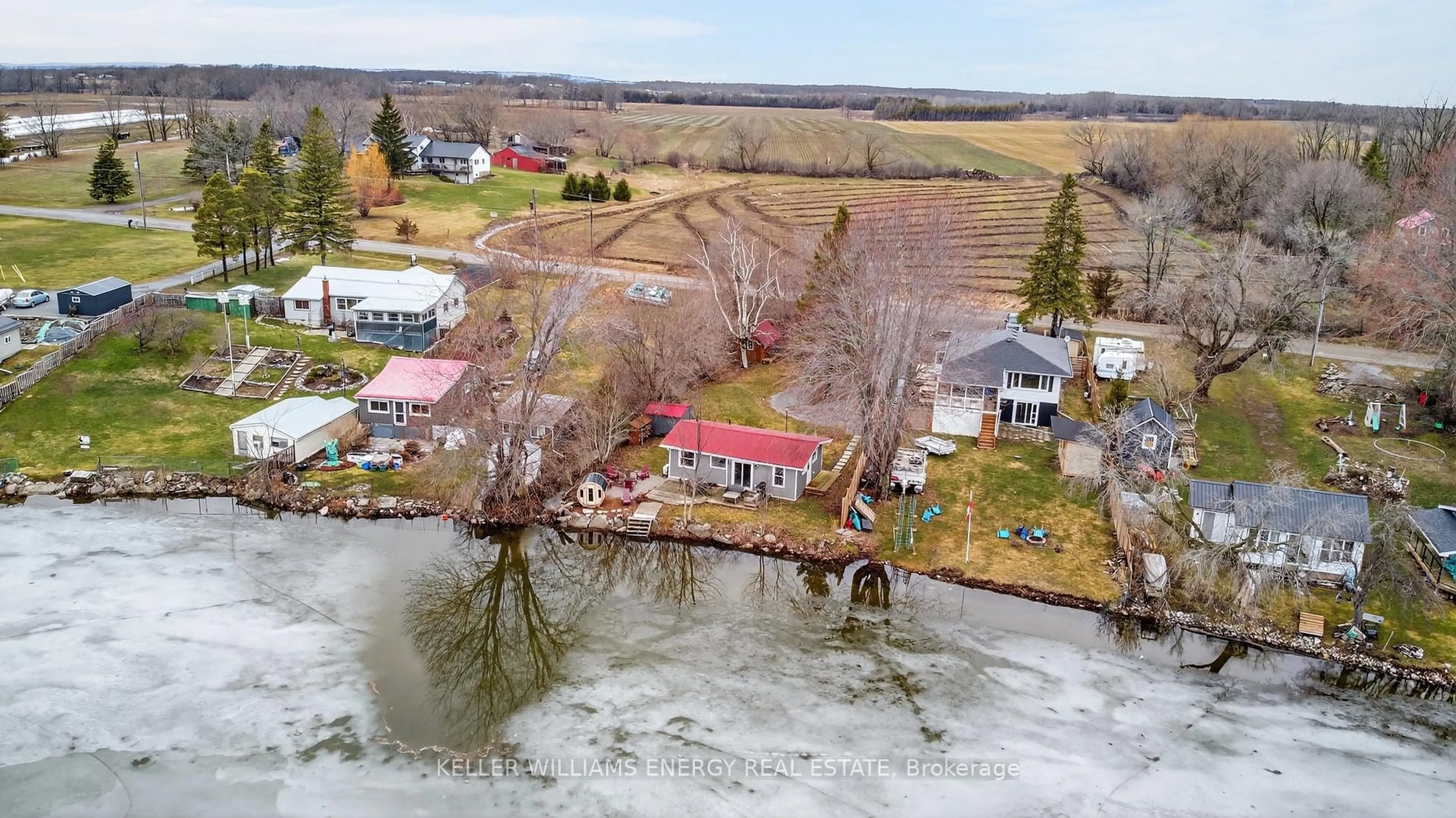 A pic from outside/outdoor area/front of a property/back of a property/a pic from drone, water/lake/river/ocean view for 1071C Lakeside Dr, Prince Edward County Ontario K0K 1T0