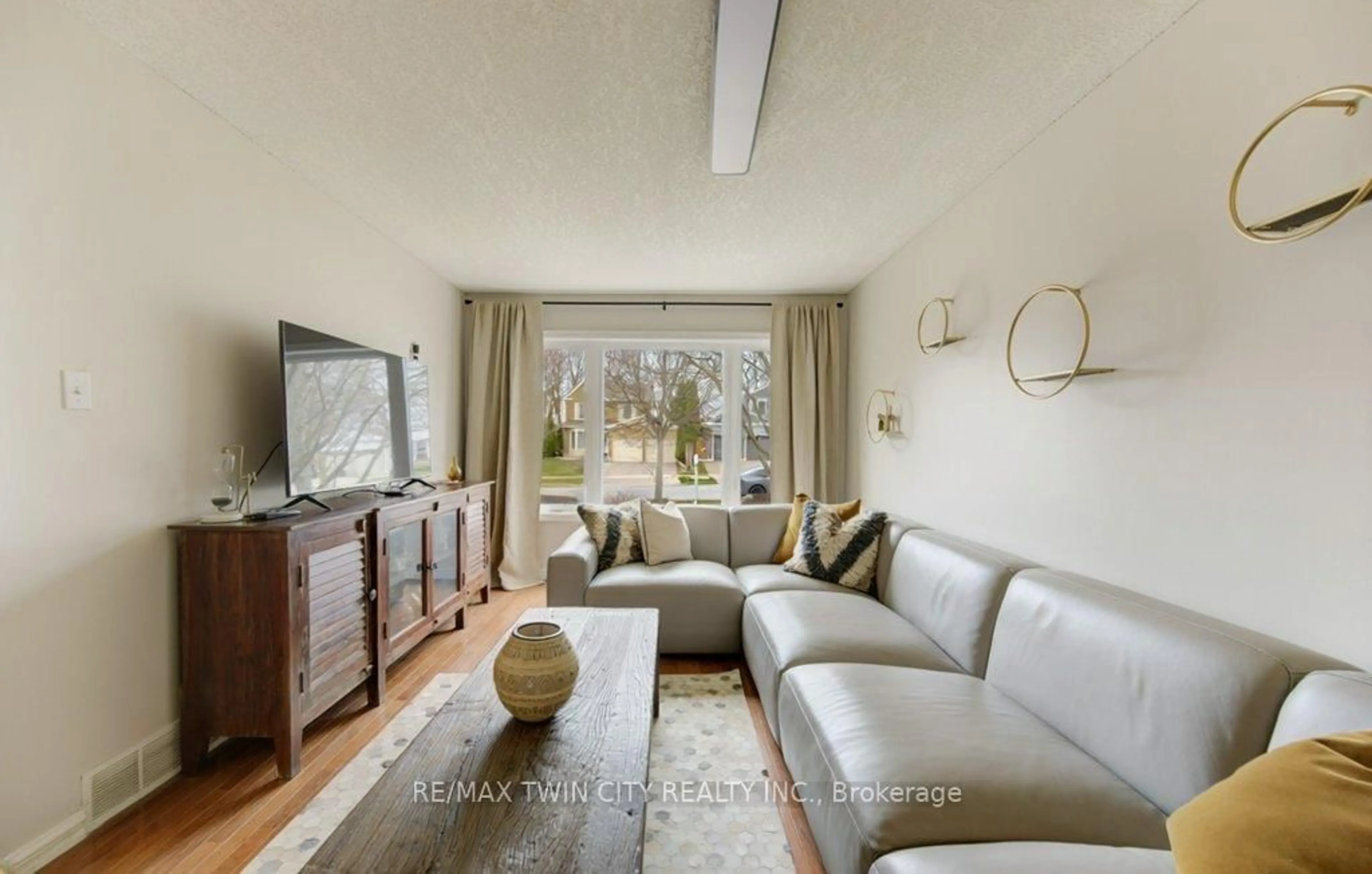 Living room with furniture, unknown for 15 Deerwood Cres, Kitchener Ontario N2N 1R4