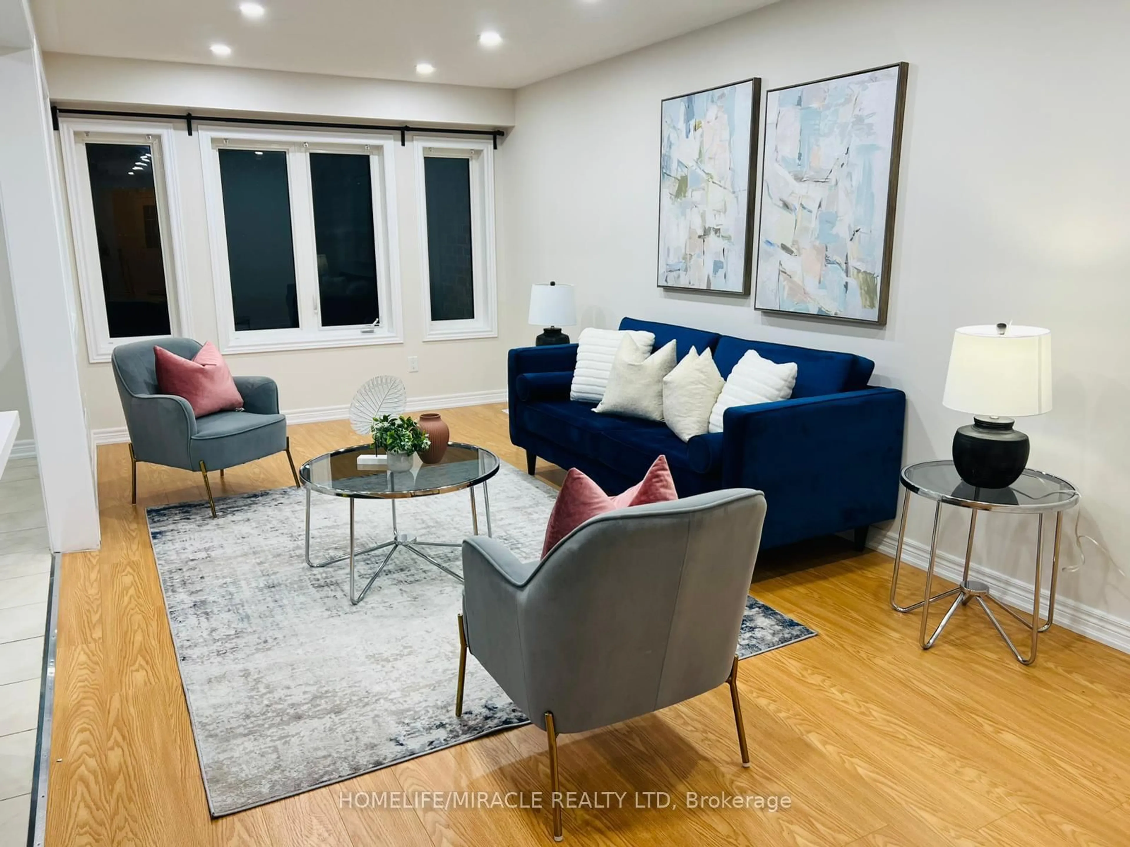 Living room with furniture, wood/laminate floor for 570 Linden Dr #3, Cambridge Ontario N3H 0C9