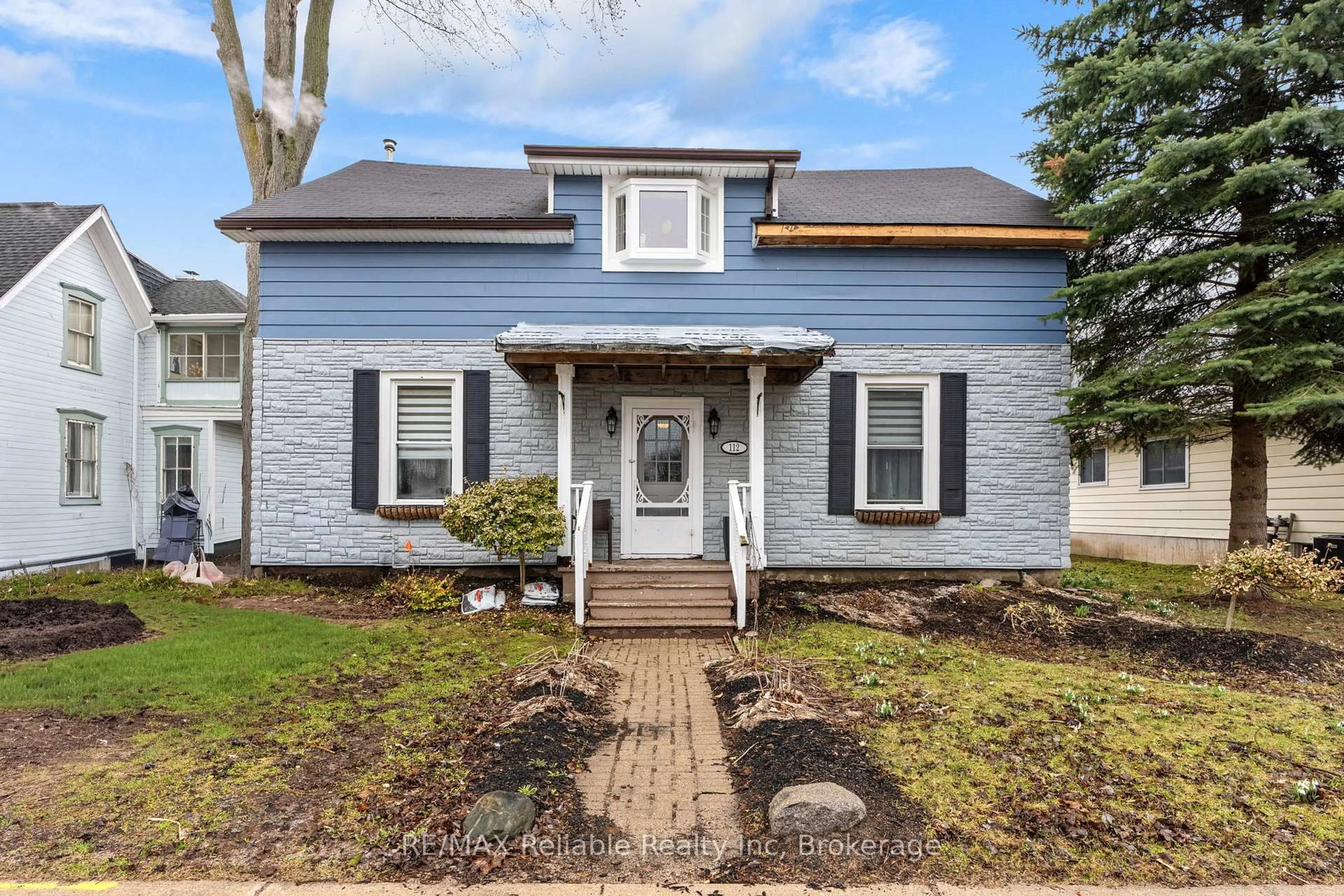 Home with vinyl exterior material, street for 112 Goderich St, Huron East Ontario N0K 1W0