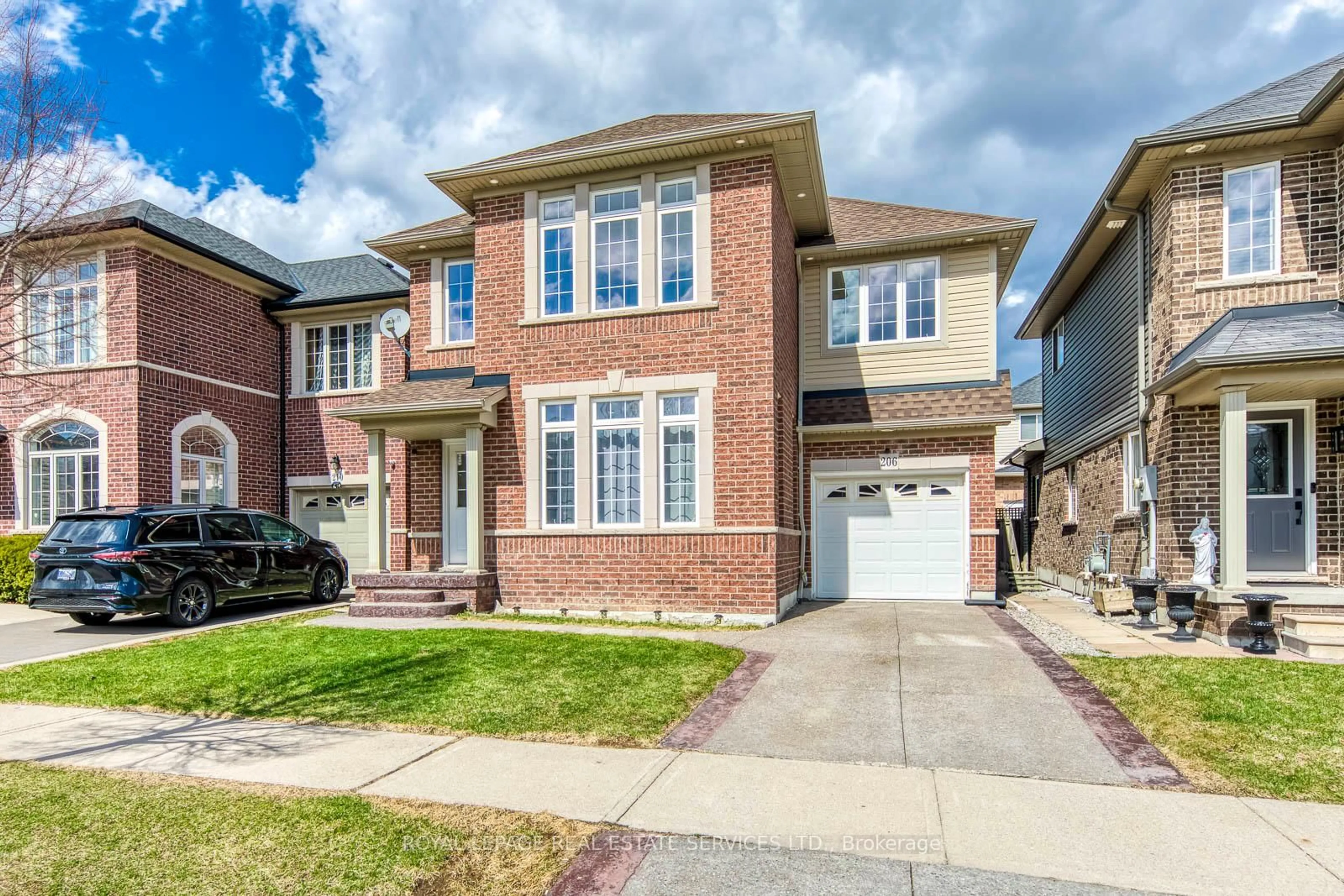 Home with brick exterior material, street for 206 Brigadoon Dr, Hamilton Ontario L9C 0B5