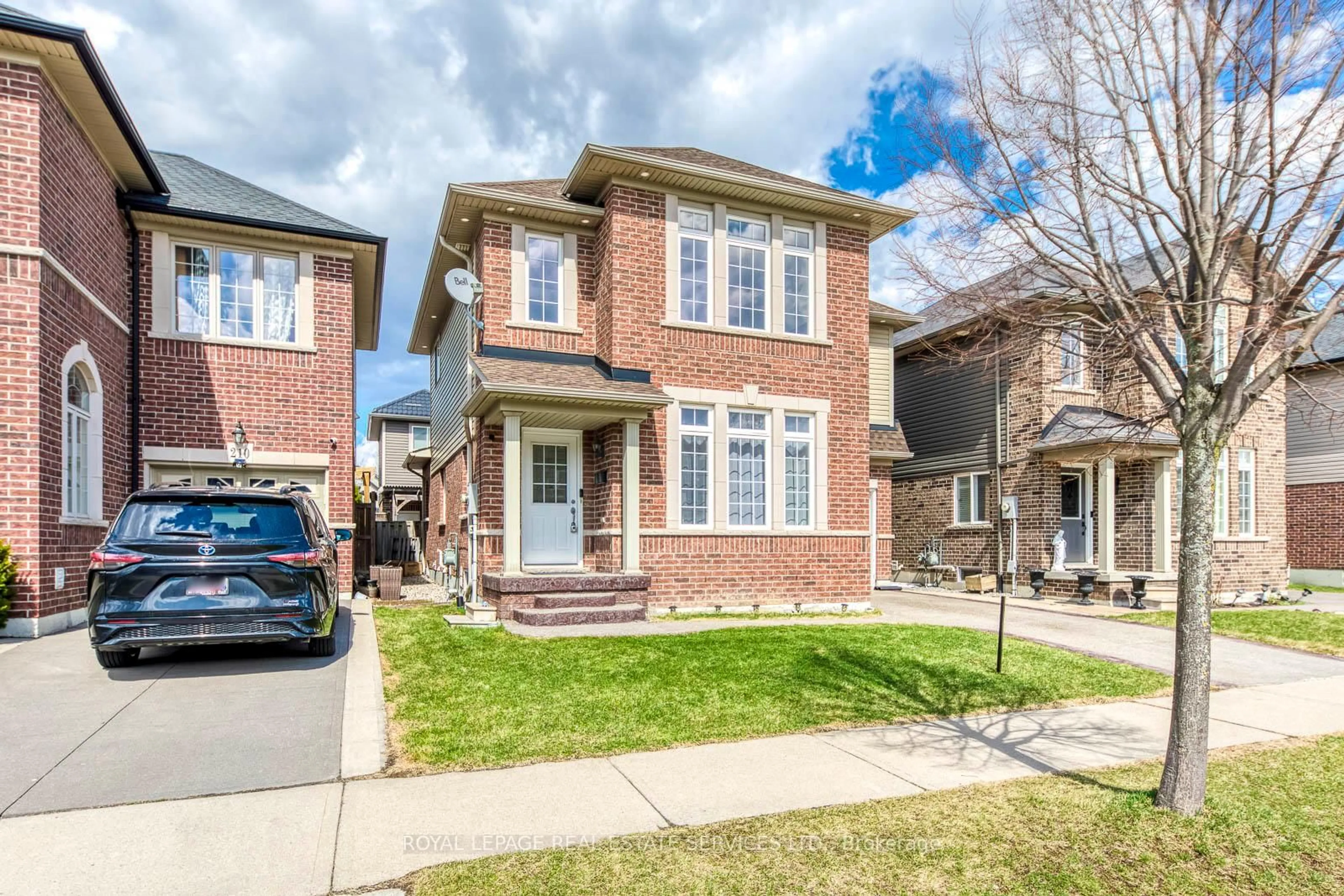 Home with brick exterior material, street for 206 Brigadoon Dr, Hamilton Ontario L9C 0B5