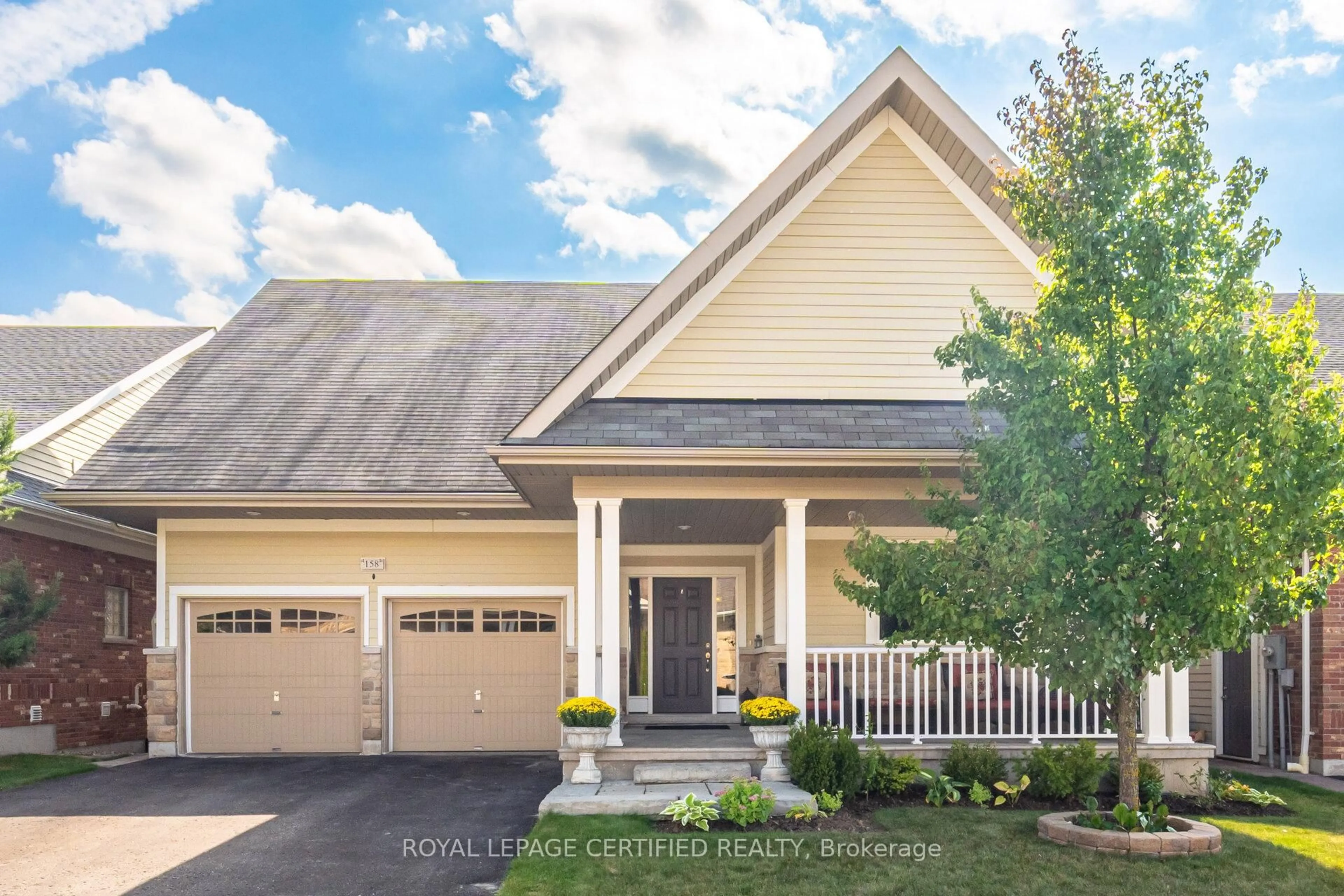 Home with vinyl exterior material, street for 200 Kingfisher Dr #158, Mono Ontario L6W 0B3