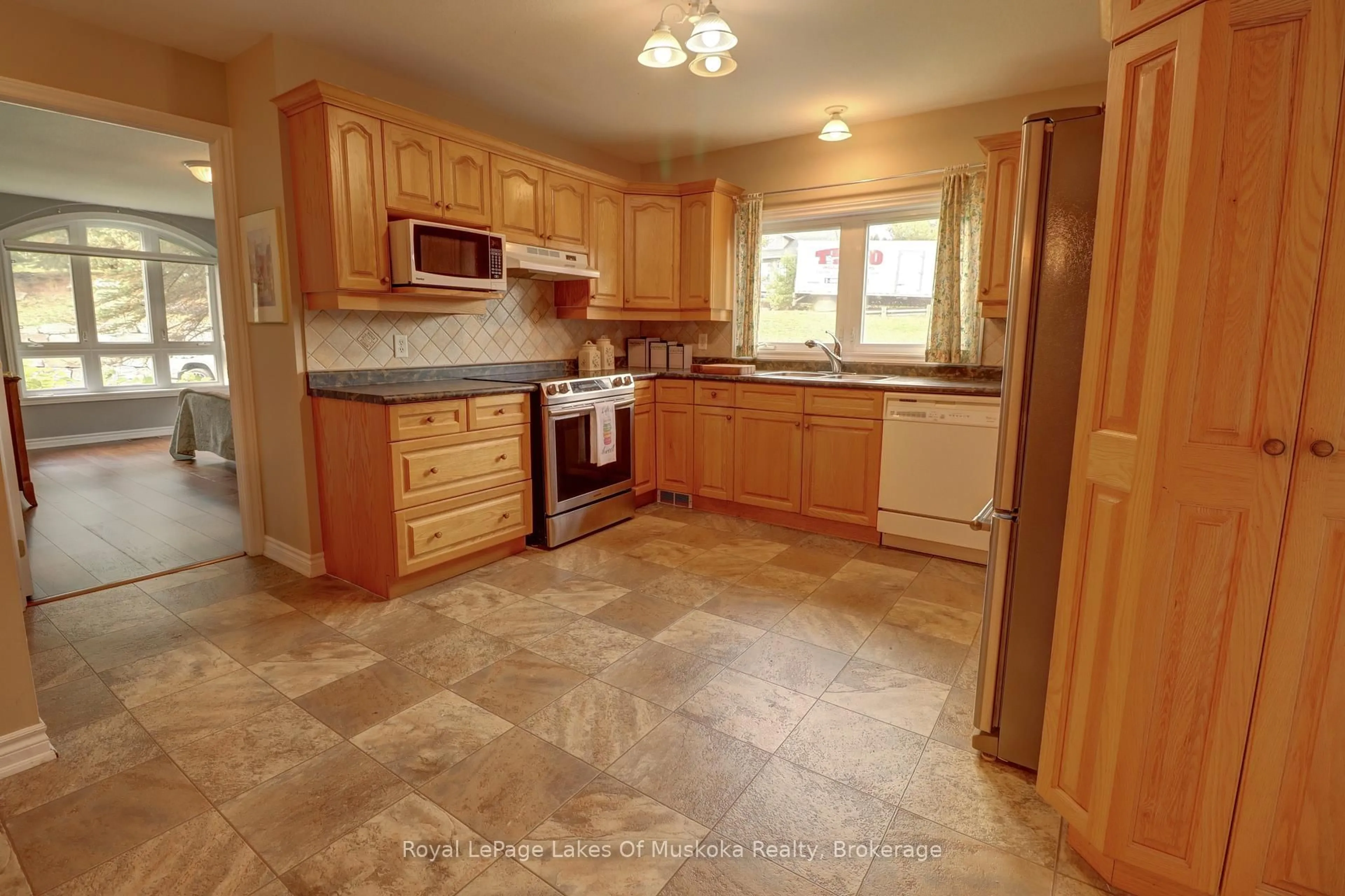 Standard kitchen, ceramic/tile floor for 31 Dairy Lane #106, Huntsville Ontario P1H 2L7