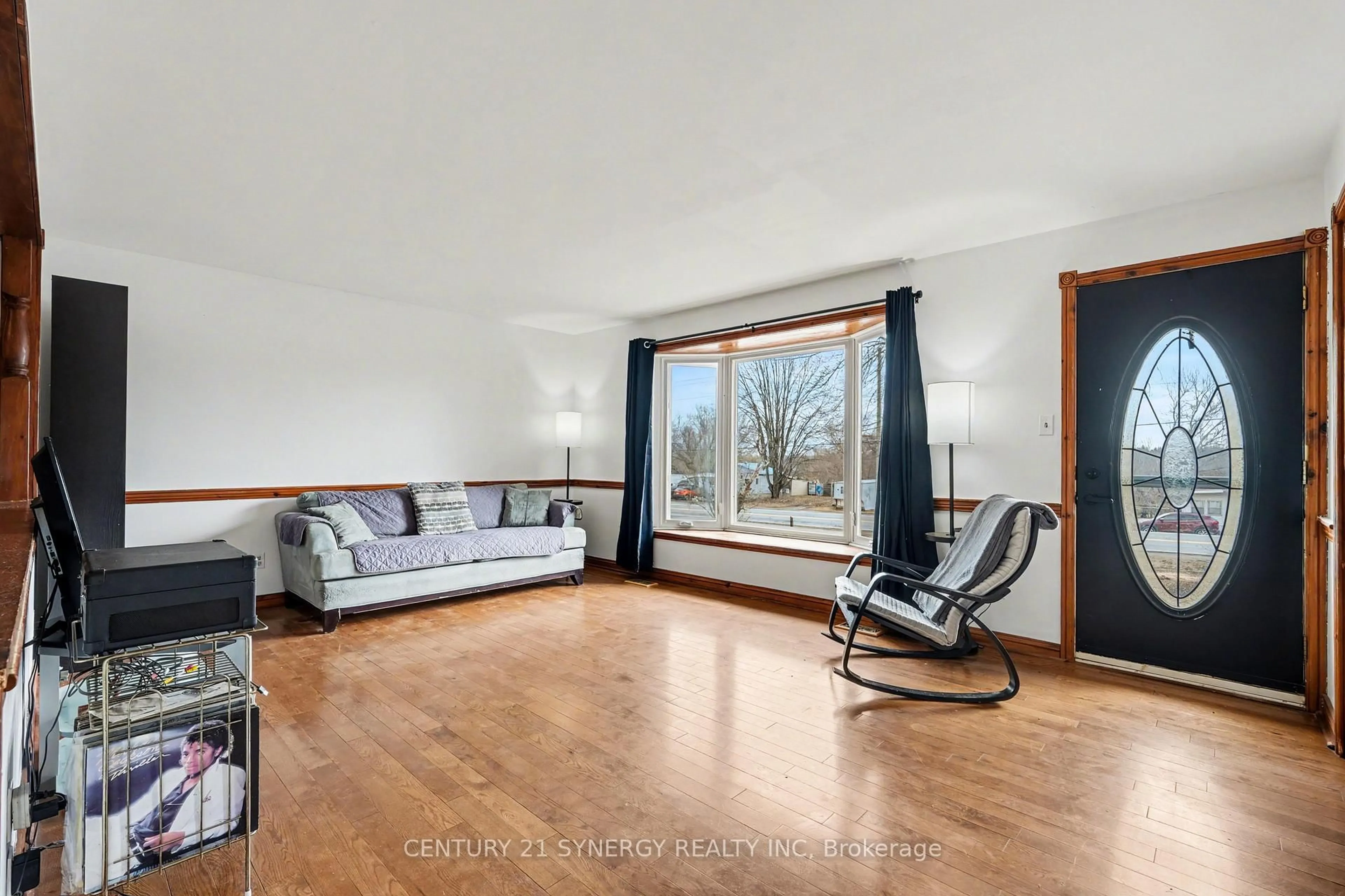 Living room with furniture, wood/laminate floor for 318 County Rd 16 Rd, Elizabethtown-Kitley Ontario K0G 1G0