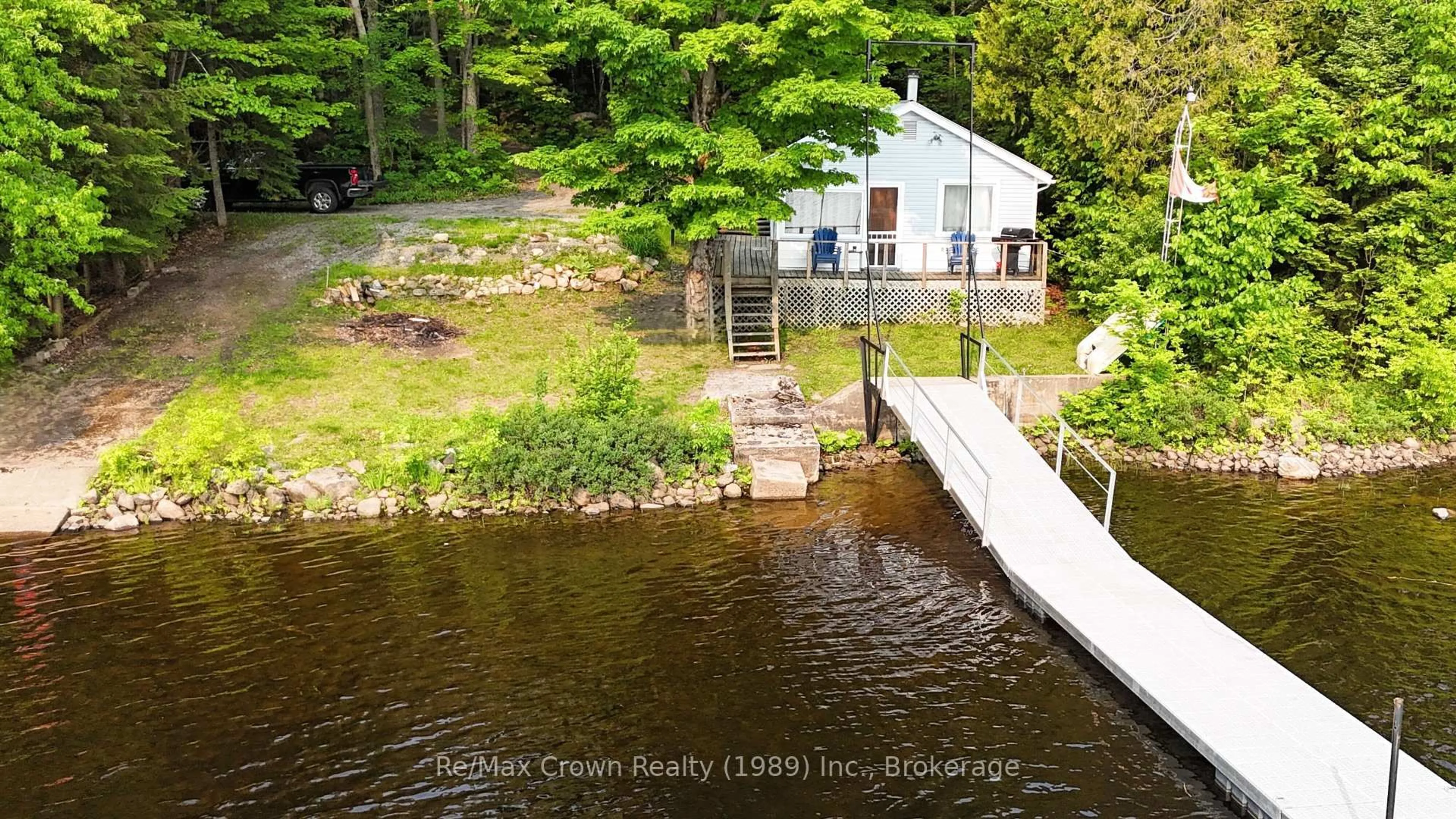 A pic from outside/outdoor area/front of a property/back of a property/a pic from drone, water/lake/river/ocean view for 17 Riverview Lane, Parry Sound Remote Area Ontario P0H 2R0