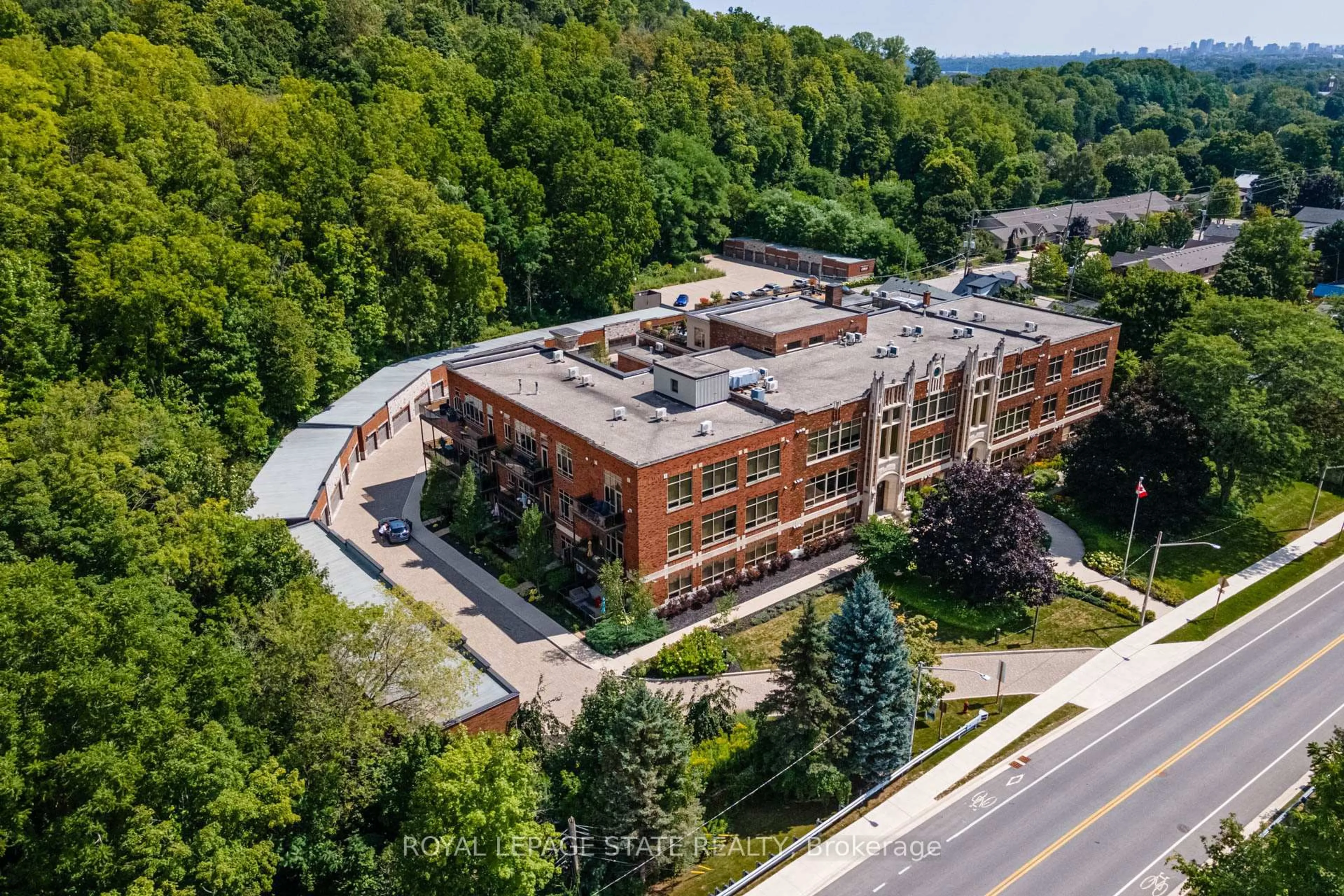 A pic from outside/outdoor area/front of a property/back of a property/a pic from drone, building for 397 King St #215, Hamilton Ontario L9H 1W9