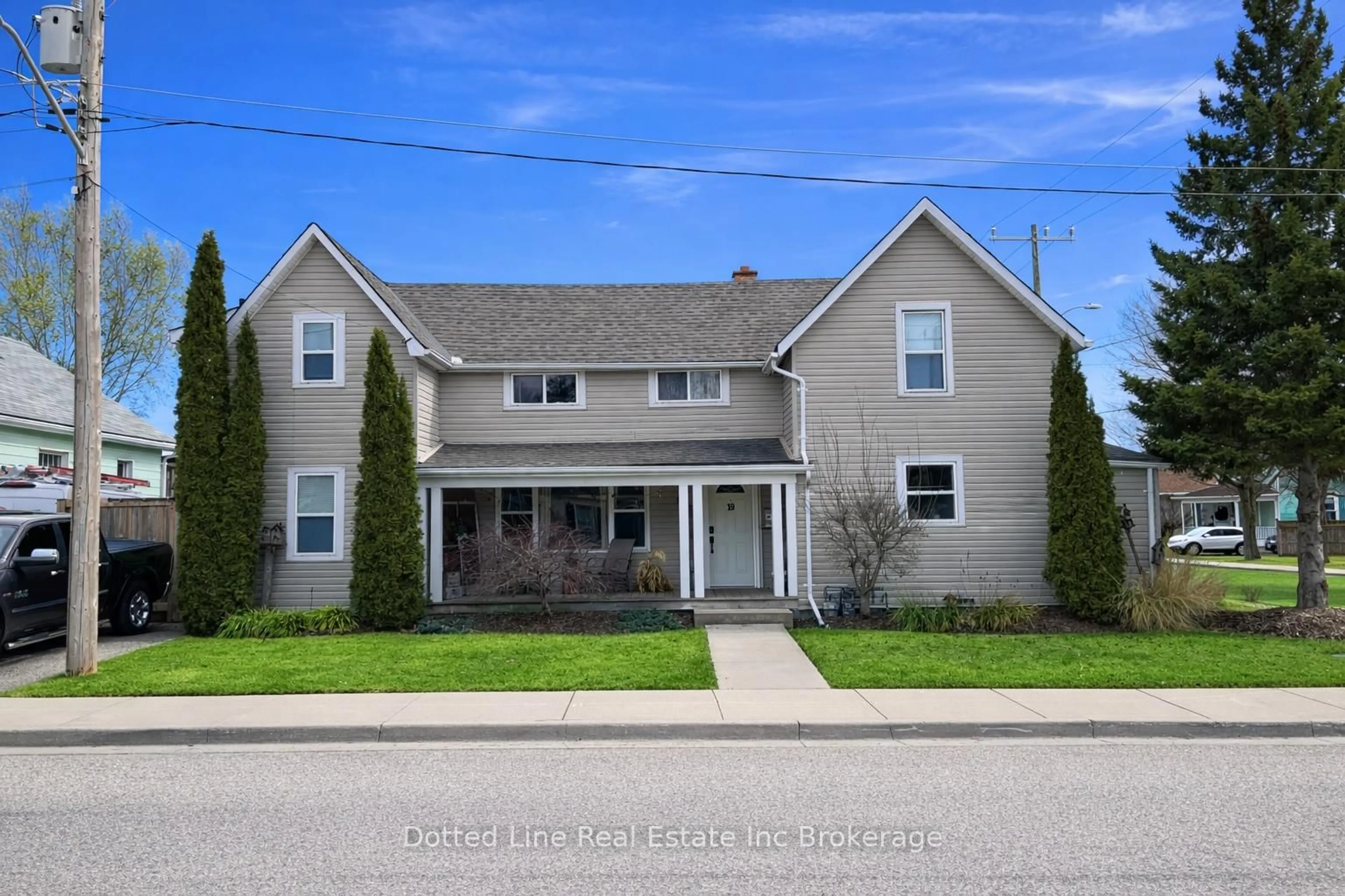 Home with vinyl exterior material, street for 19 Wolf St, Tillsonburg Ontario N4G 1S2