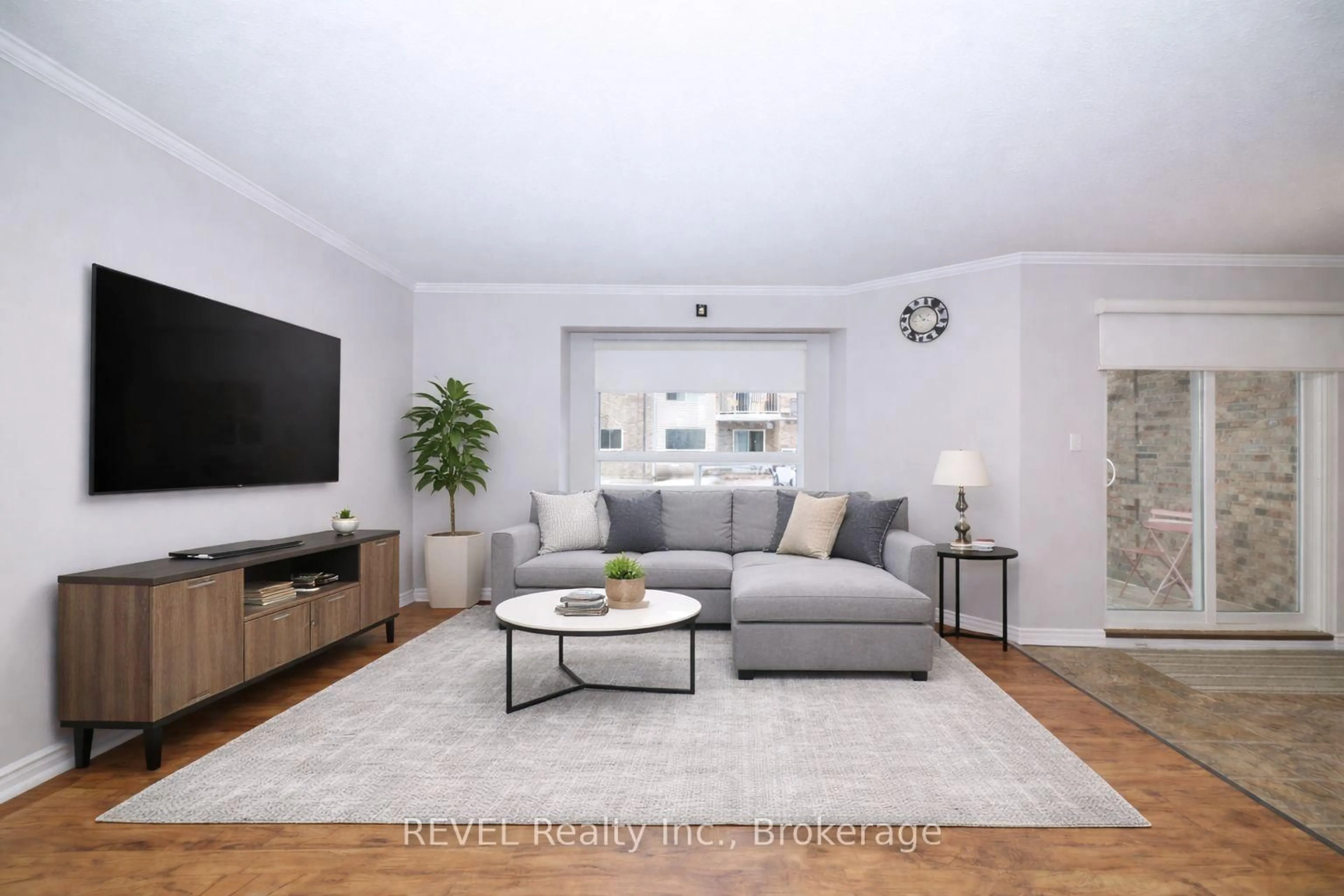 Living room with furniture, unknown for 1061 Vansickle Rd #106, St. Catharines Ontario L2S 2X4