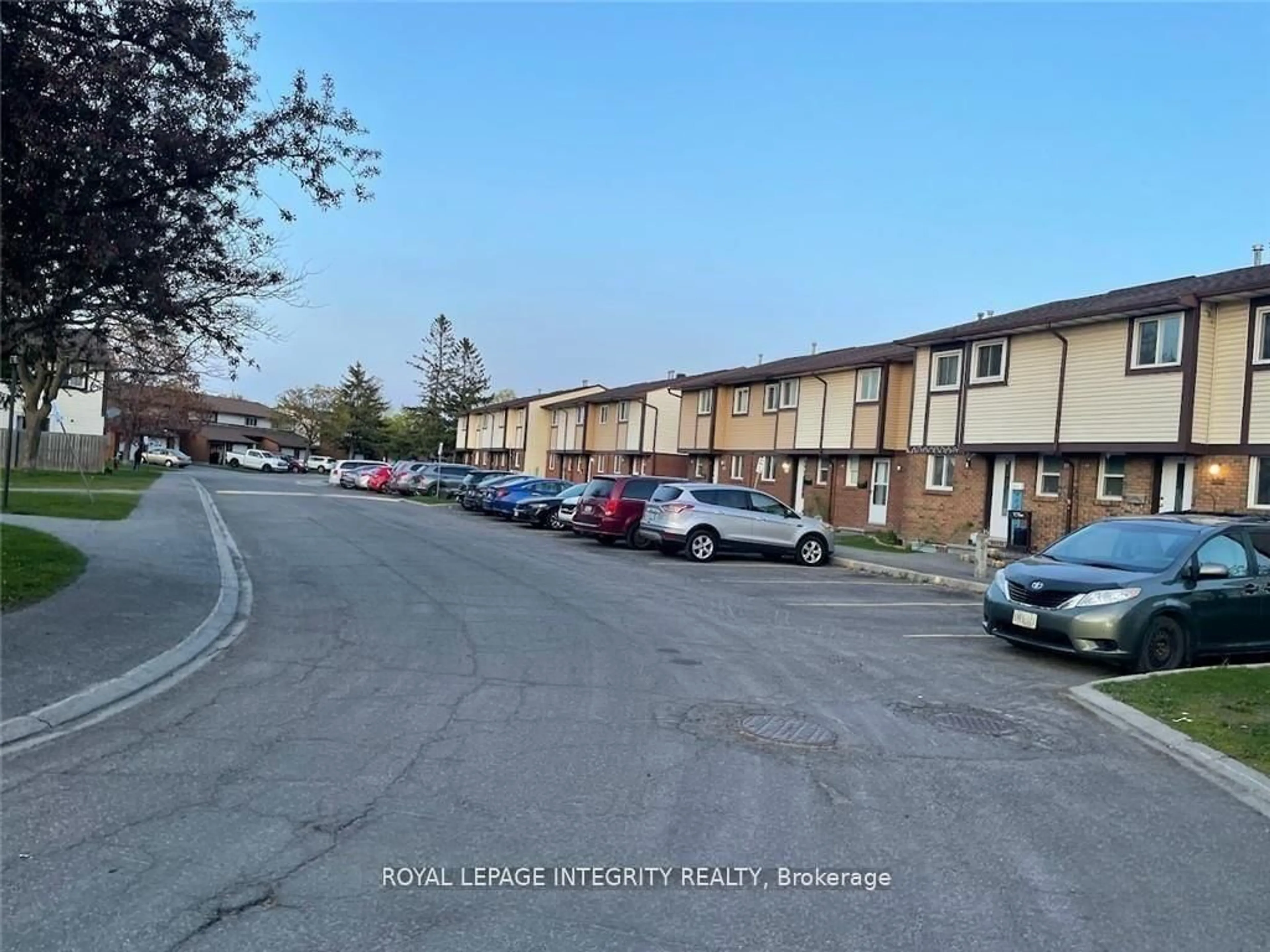 A pic from outside/outdoor area/front of a property/back of a property/a pic from drone, street for 1767 Dondale St #58, Ottawa Ontario K1B 5H7