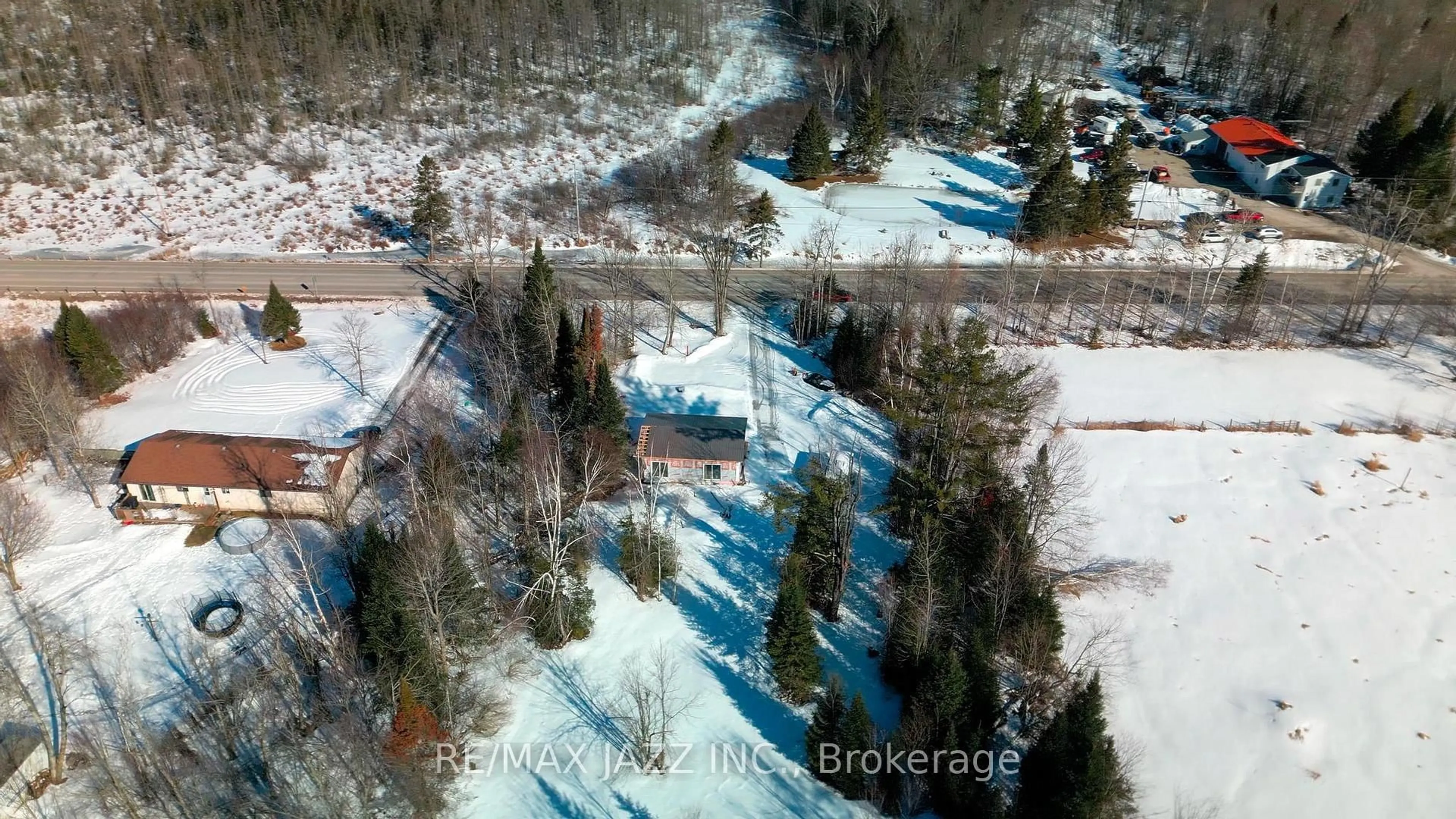 A pic from outside/outdoor area/front of a property/back of a property/a pic from drone, street for 3338 Monck Rd, Kawartha Lakes Ontario K0M 1K0