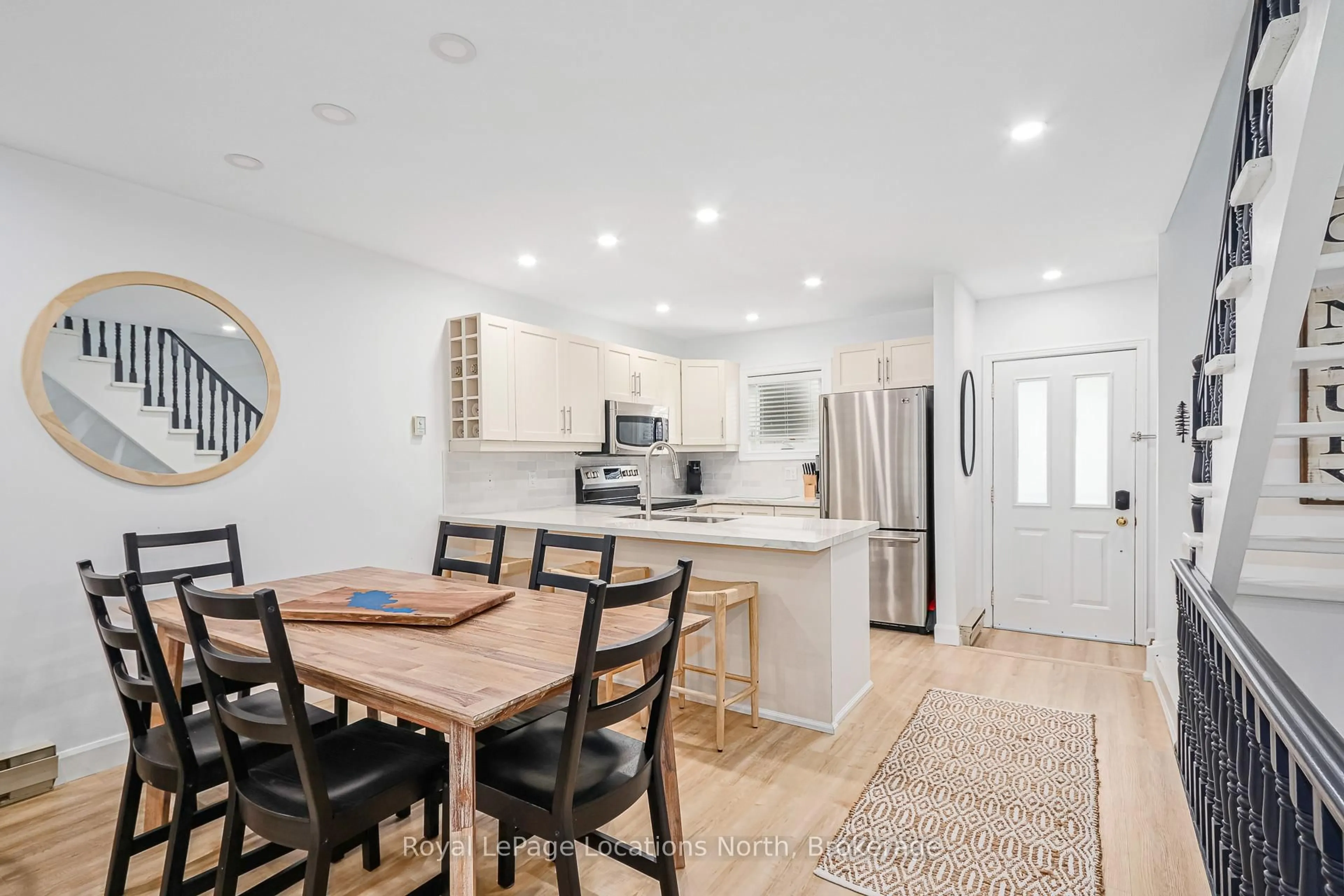 Open concept kitchen, wood/laminate floor for 100 Alice St #69, Blue Mountains Ontario N0H 2P0