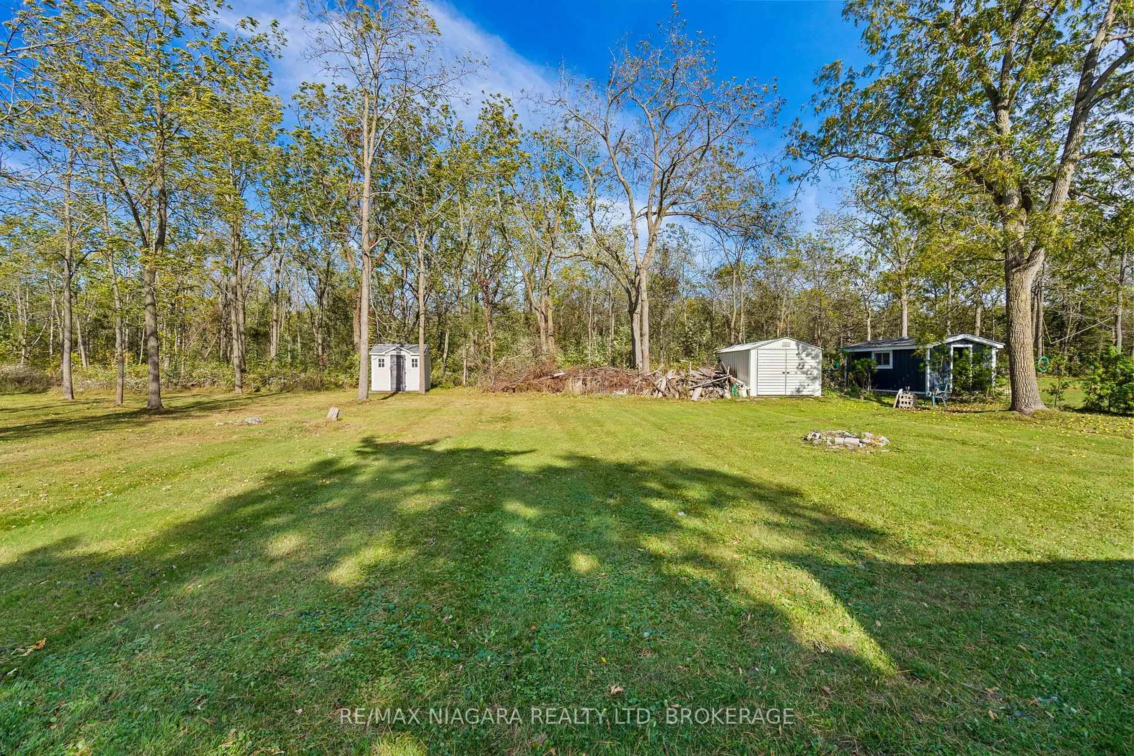 A pic from outside/outdoor area/front of a property/back of a property/a pic from drone, forest/trees view for 11496 Cook Lane, Wainfleet Ontario L3K 5V4