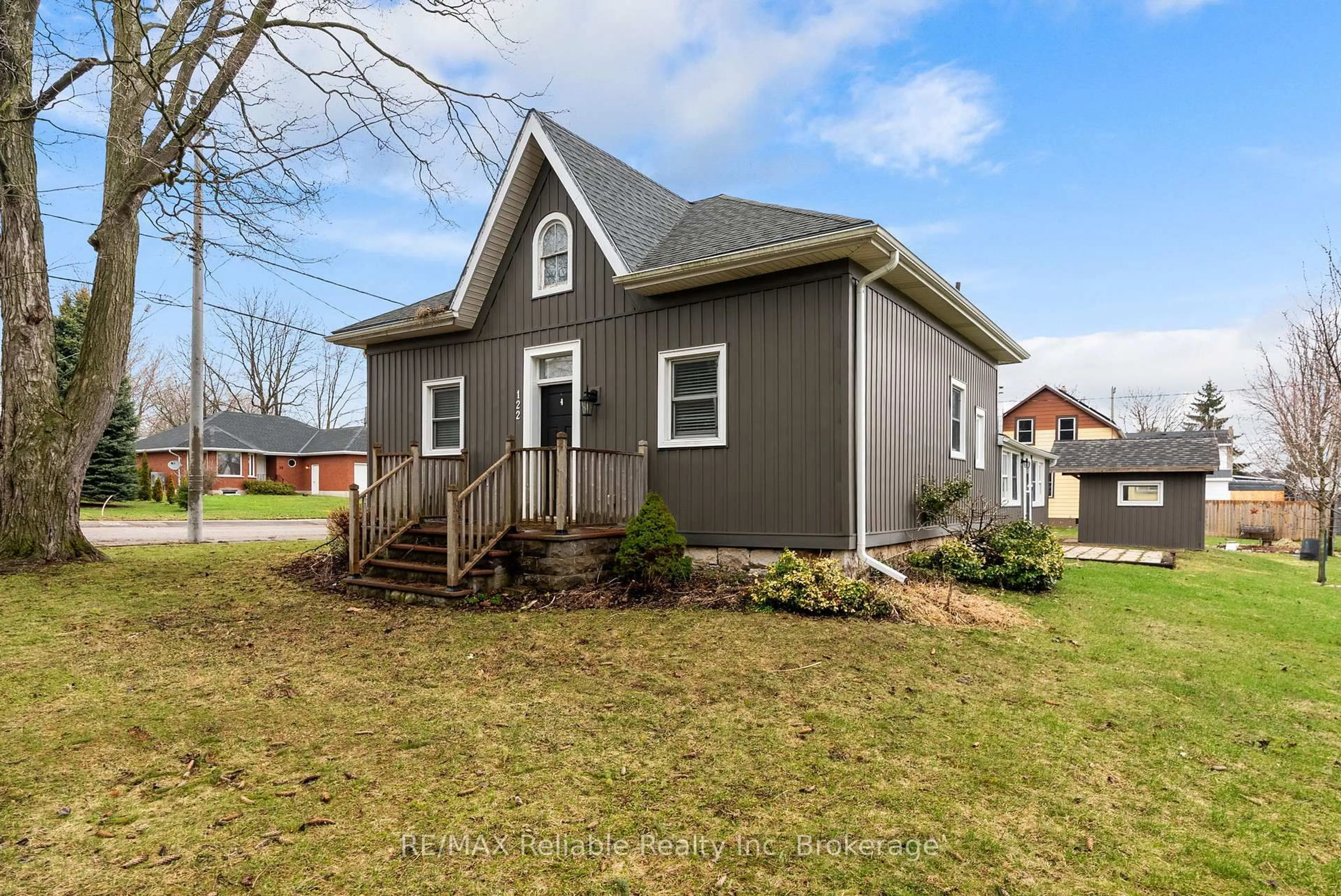 Home with vinyl exterior material, street for 122 Victoria St, Huron East Ontario N0K 1W0