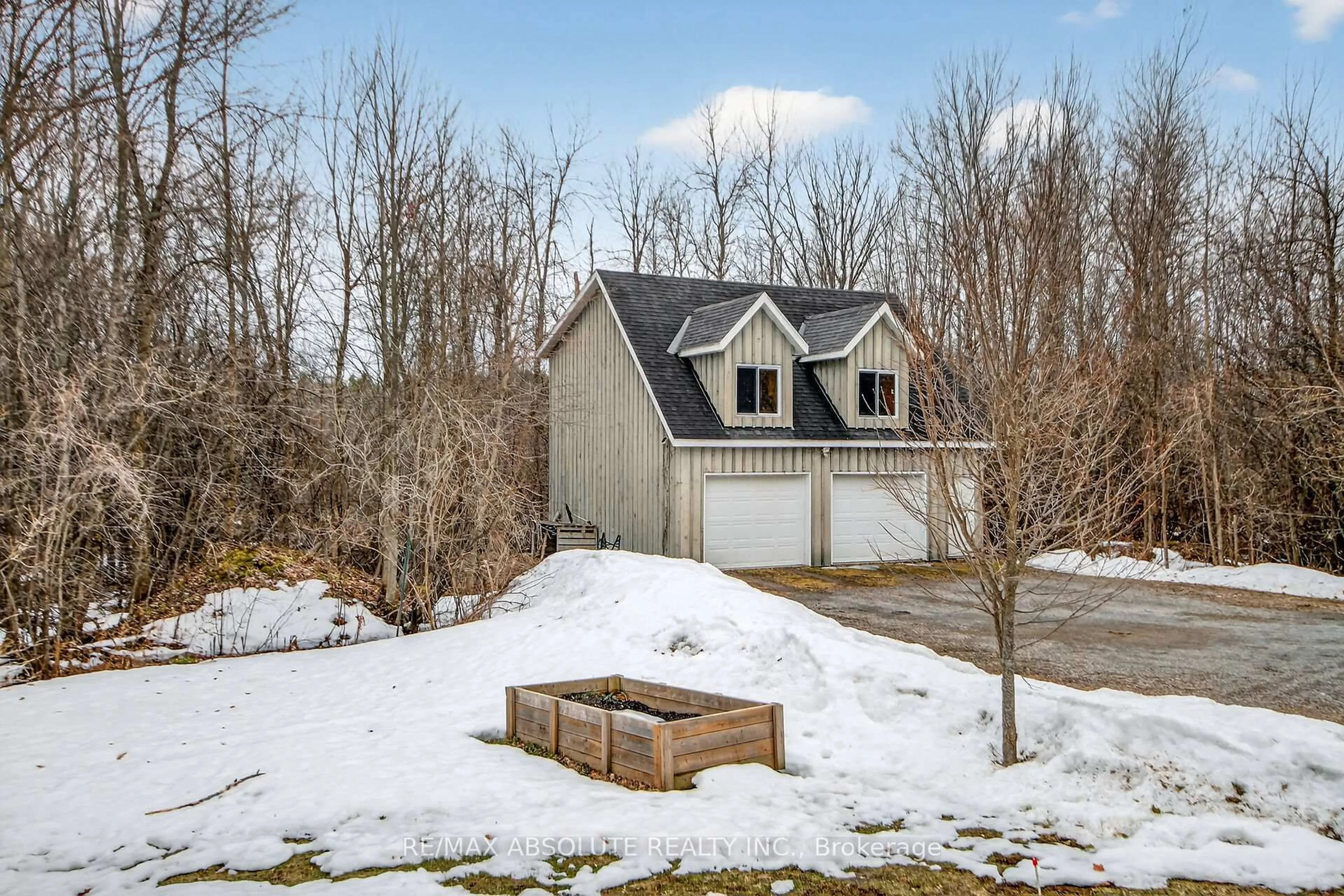 A pic from outside/outdoor area/front of a property/back of a property/a pic from drone, mountain view for 689 Rideau River Rd, Merrickville Ontario K0G 1N0