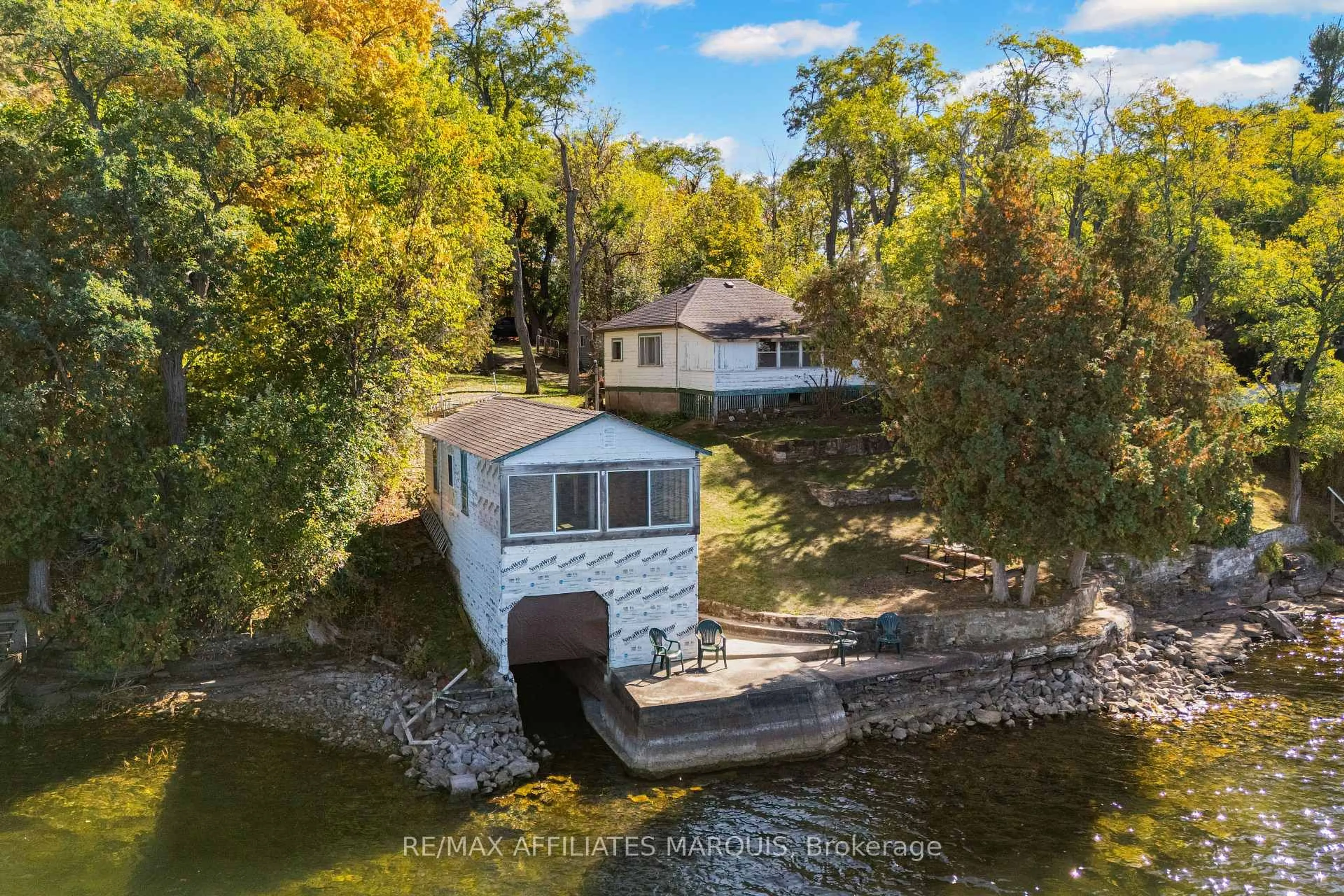 A pic from outside/outdoor area/front of a property/back of a property/a pic from drone, water/lake/river/ocean view for 6 R9 (rideau Ferry) Rd, Rideau Lakes Ontario K0G 1L0