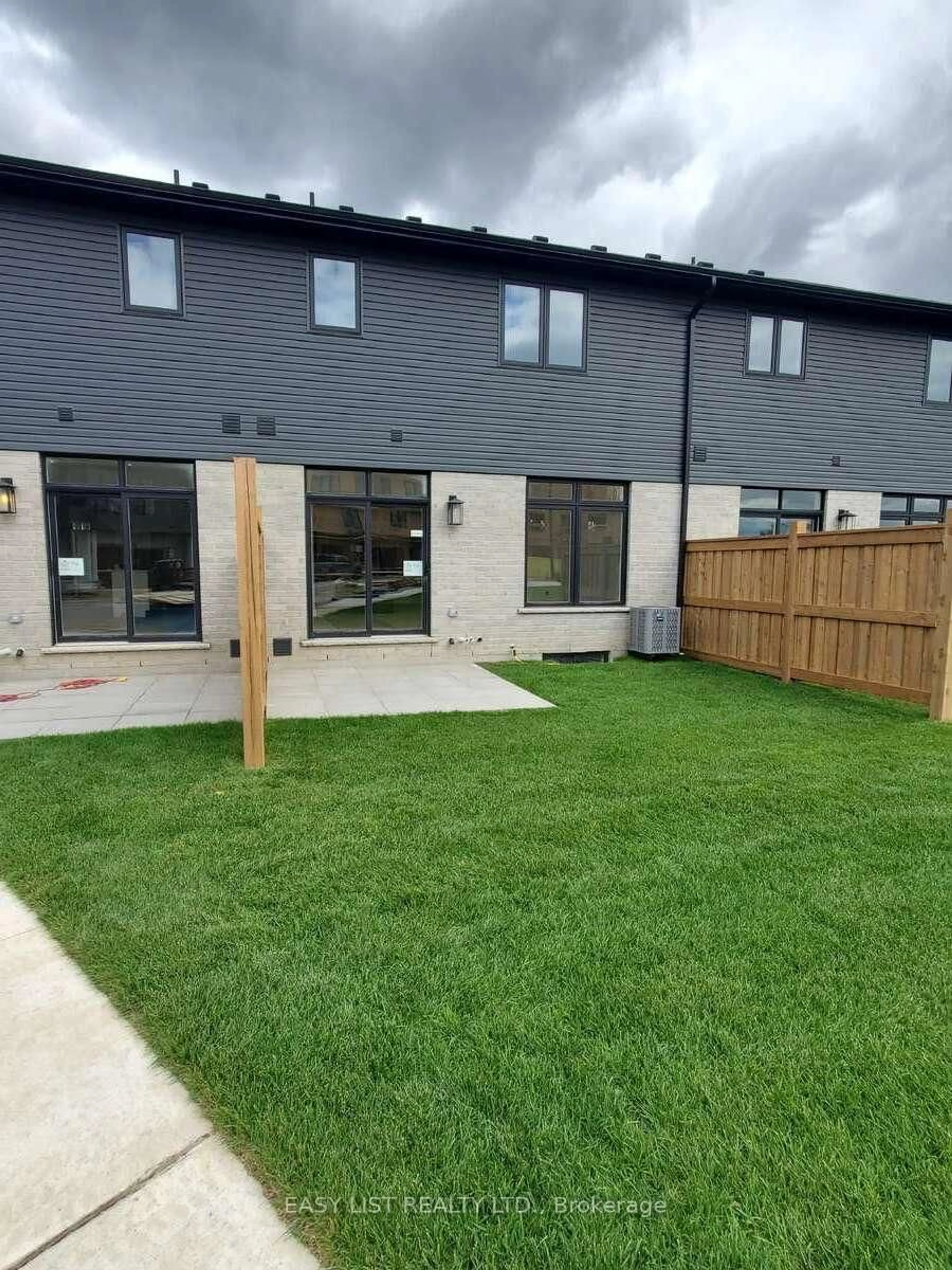 A pic from outside/outdoor area/front of a property/back of a property/a pic from drone, street for 55 Teal Dr #47, Guelph Ontario N1C 1G4