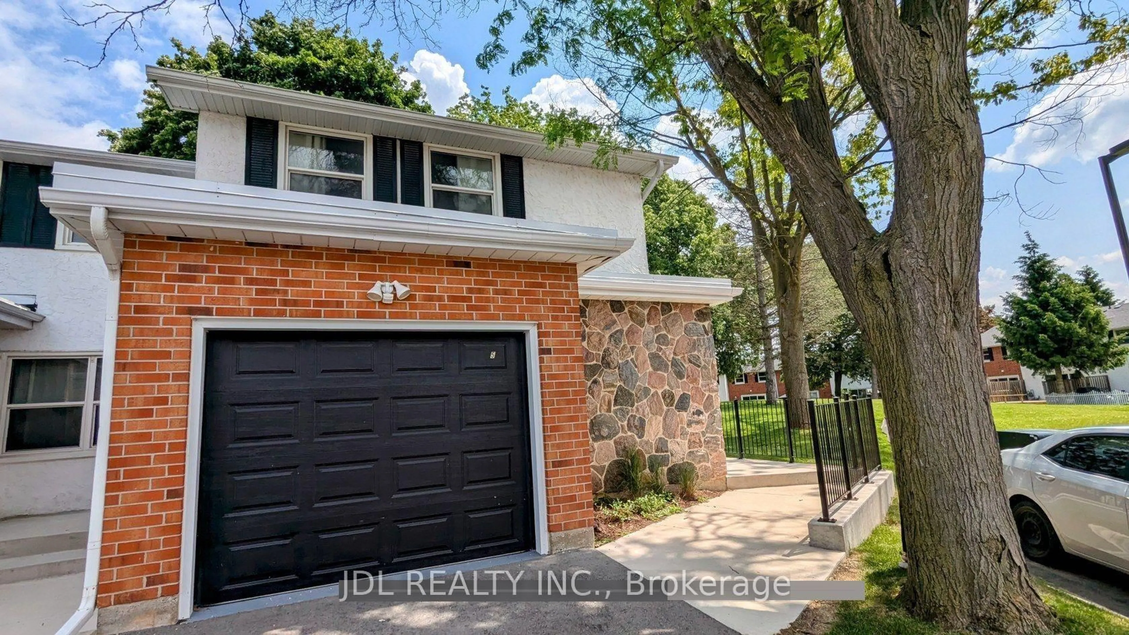 Home with brick exterior material, street for 431 Keats Way #5, Waterloo Ontario N2L 5S7