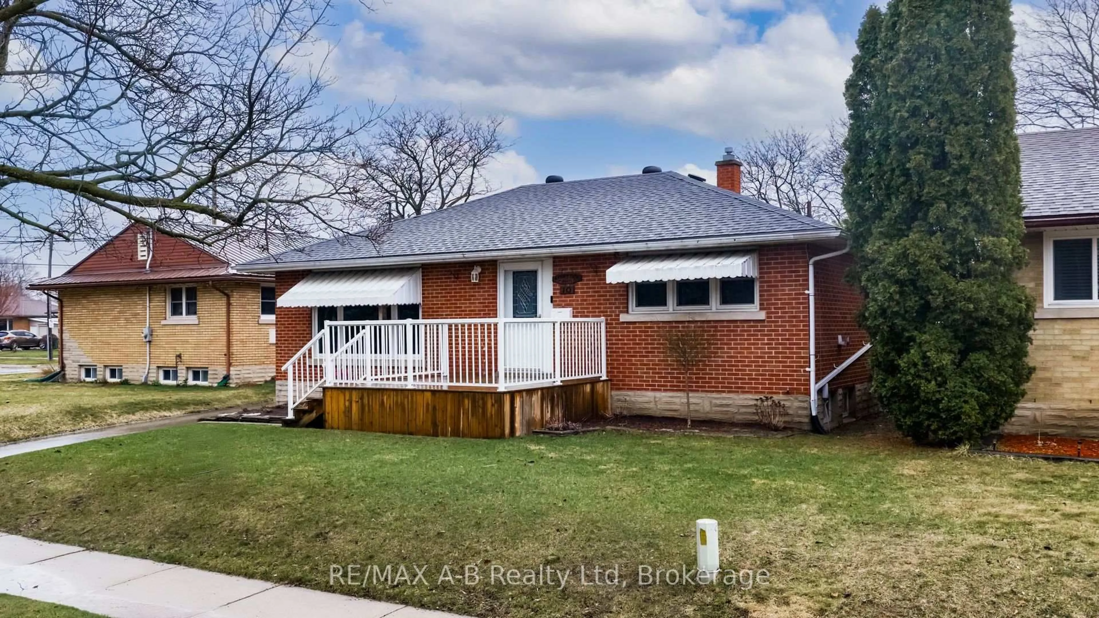 Home with brick exterior material, street for 10 Clark Ave, Kitchener Ontario N2C 1Y2