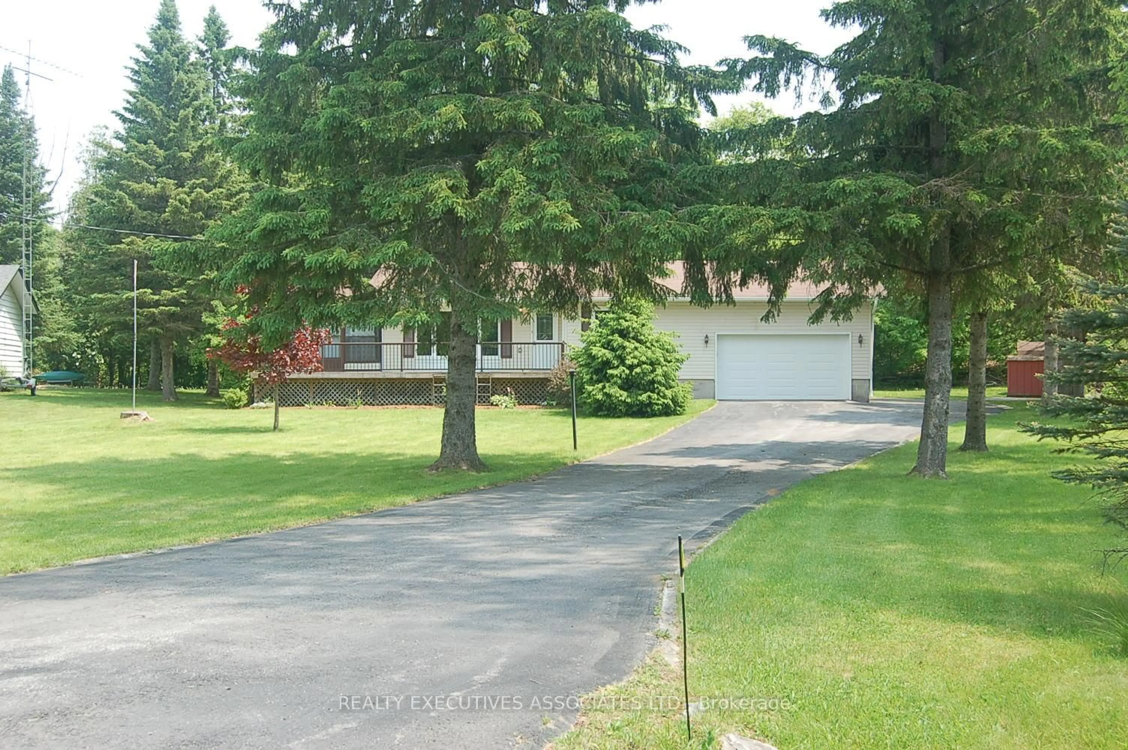 A pic from outside/outdoor area/front of a property/back of a property/a pic from drone, street for 211 Alpine Lake Rd, Trent Lakes Ontario K0M 1A0