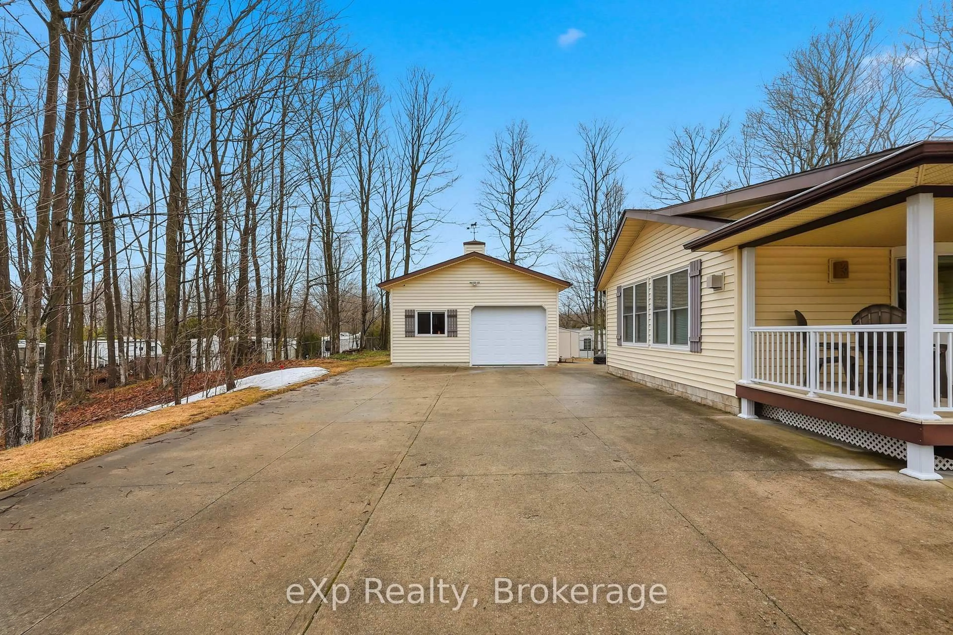 A pic from outside/outdoor area/front of a property/back of a property/a pic from drone, water/lake/river/ocean view for 75 Lakeland Dr, South Bruce Peninsula Ontario N0H 2G0