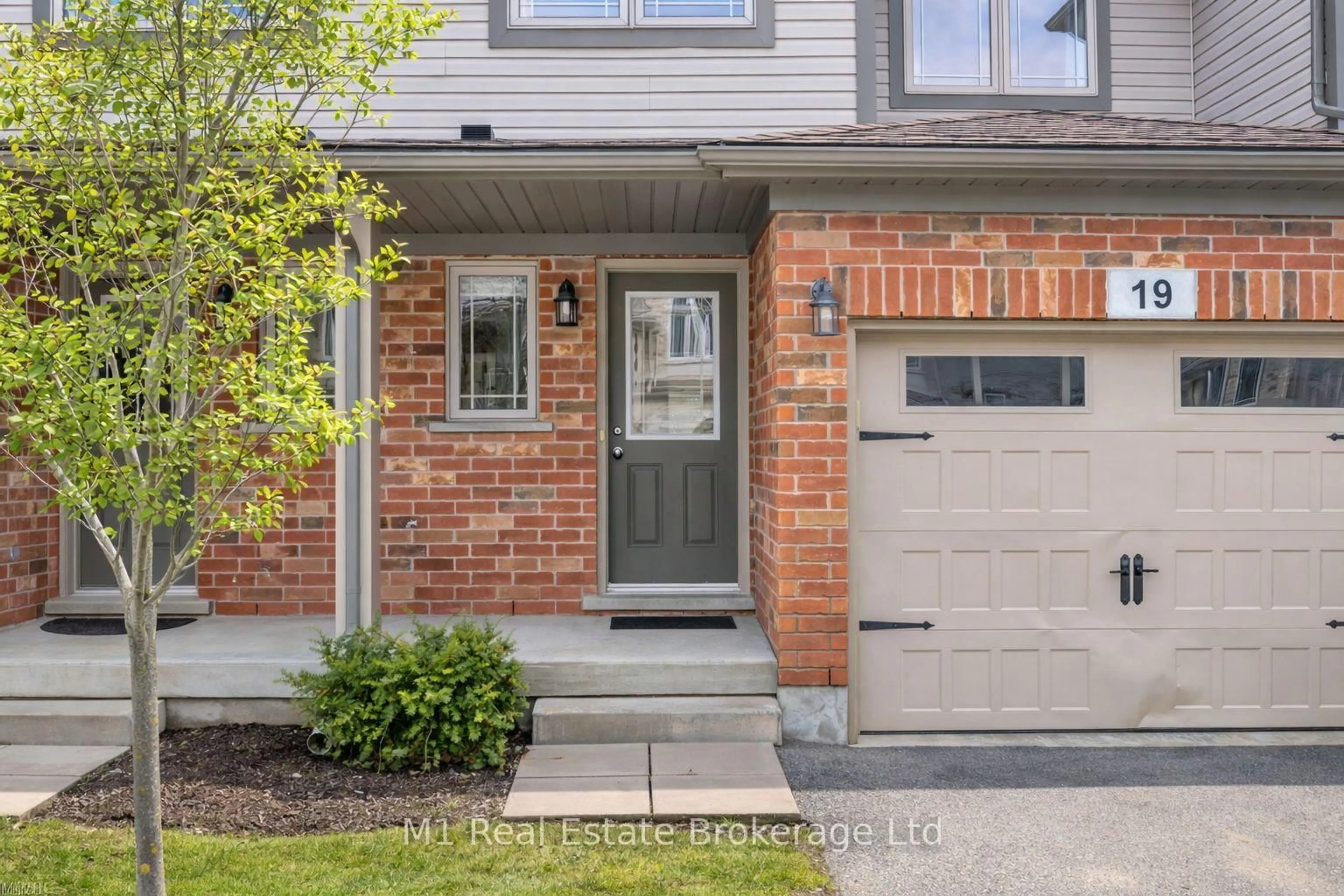 Home with brick exterior material, street for 66 Eastview Rd #19, Guelph Ontario N1E 0N1