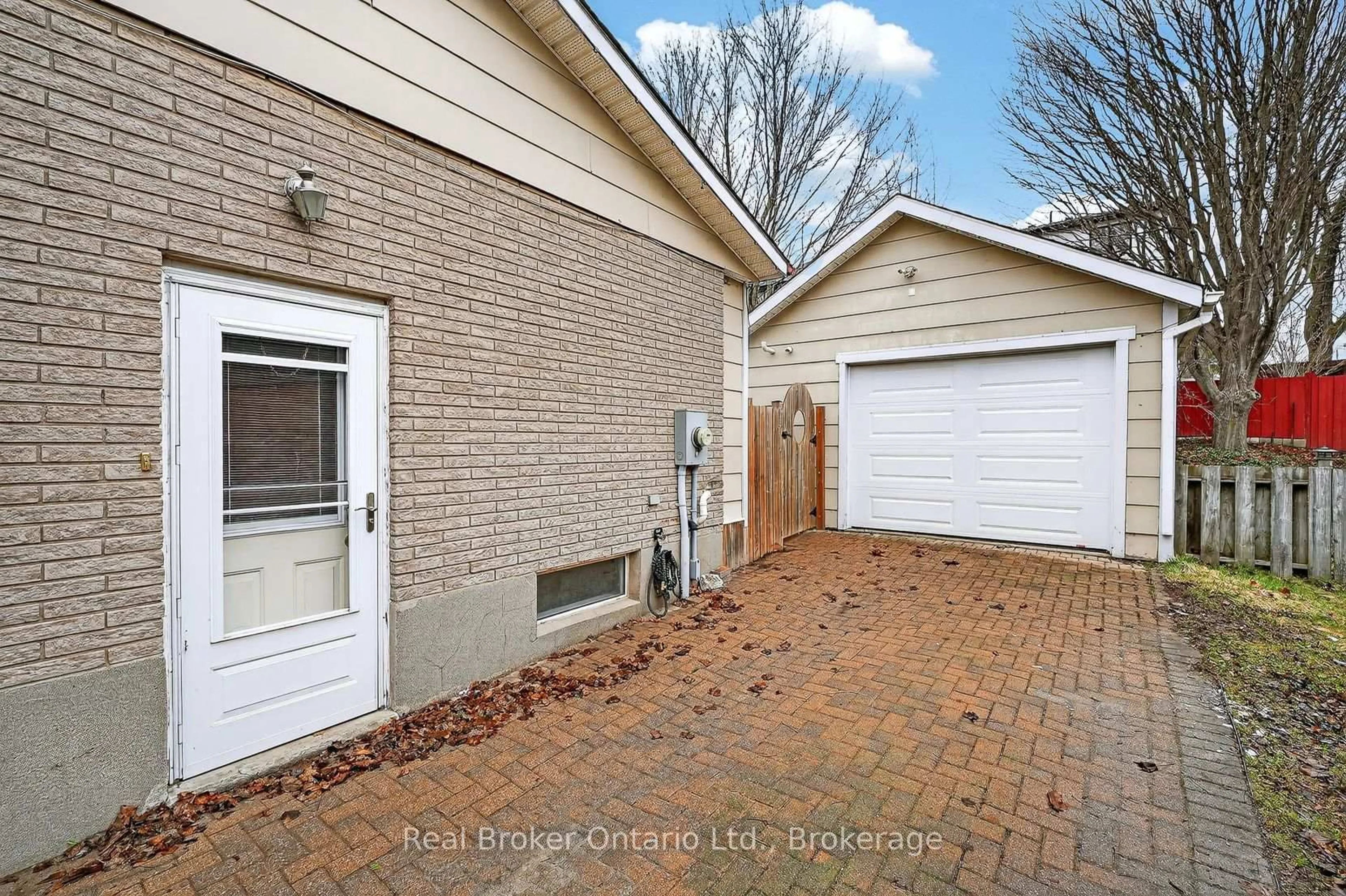 Home with brick exterior material, street for 411 Lampman Pl, Woodstock Ontario N4S 3S9