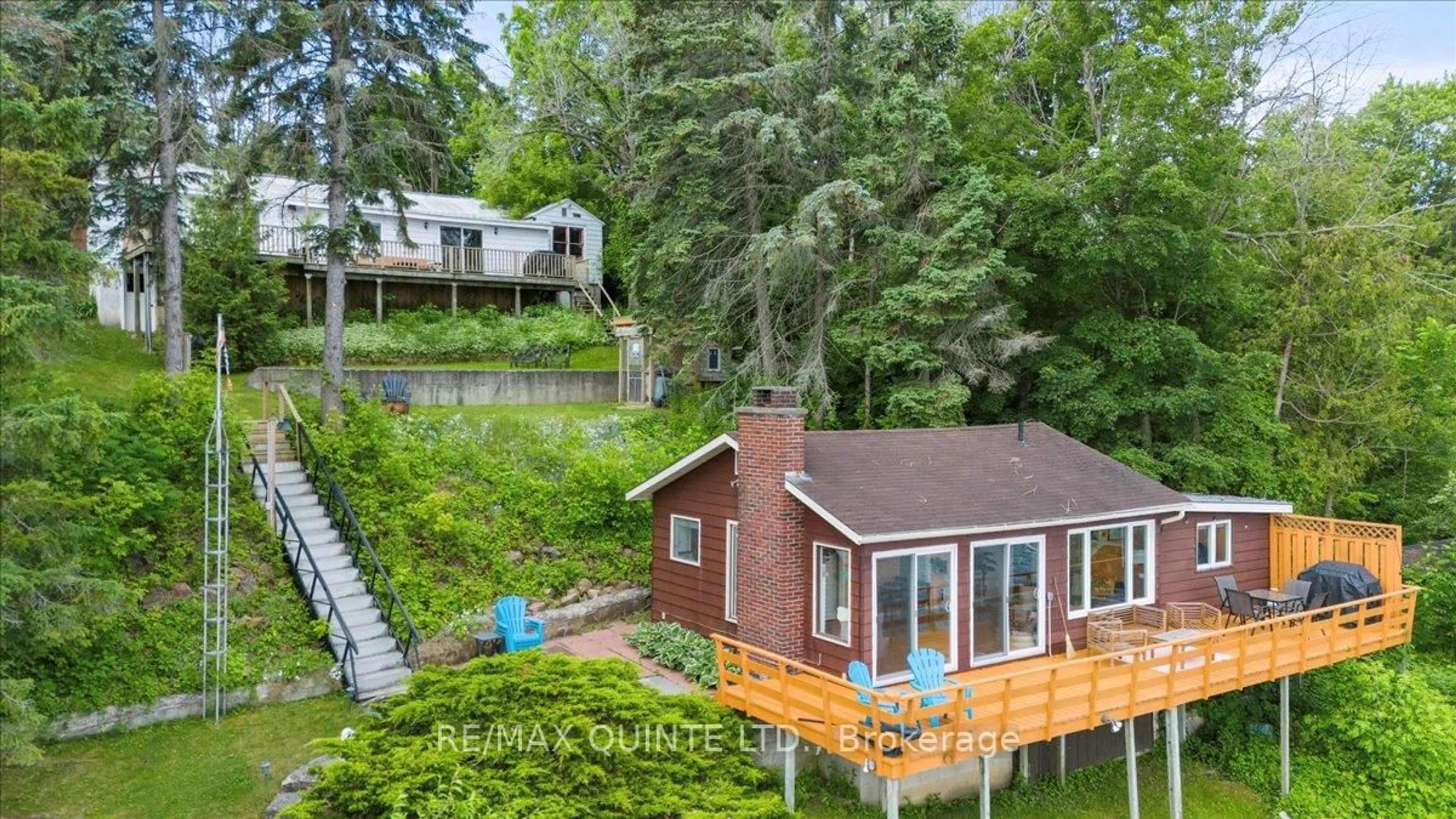 A pic from outside/outdoor area/front of a property/back of a property/a pic from drone, water/lake/river/ocean view for 11364 Loyalist Pkwy, Prince Edward County Ontario K0K 2T0