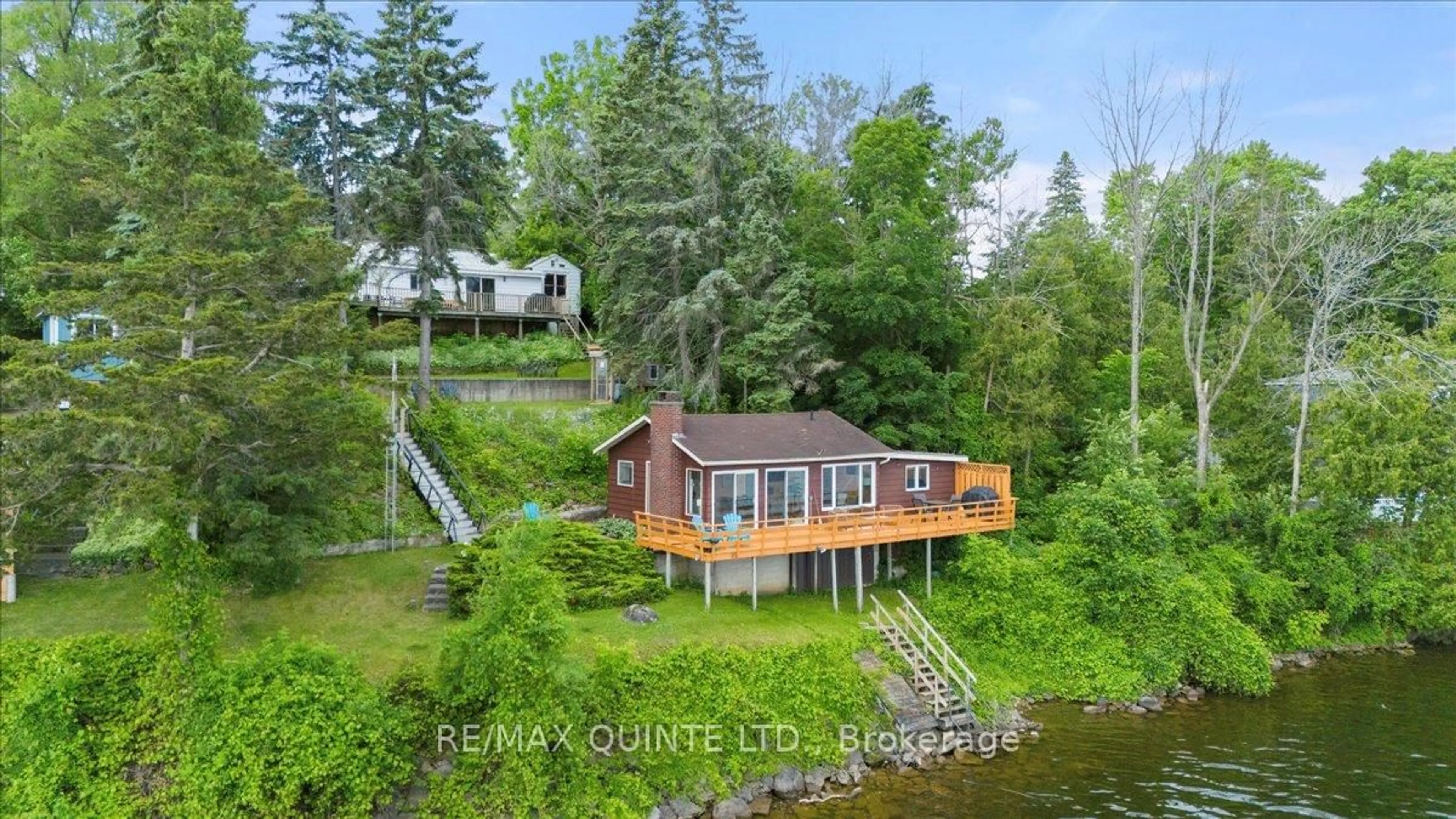 A pic from outside/outdoor area/front of a property/back of a property/a pic from drone, water/lake/river/ocean view for 11364 Loyalist Pkwy, Prince Edward County Ontario K0K 2T0
