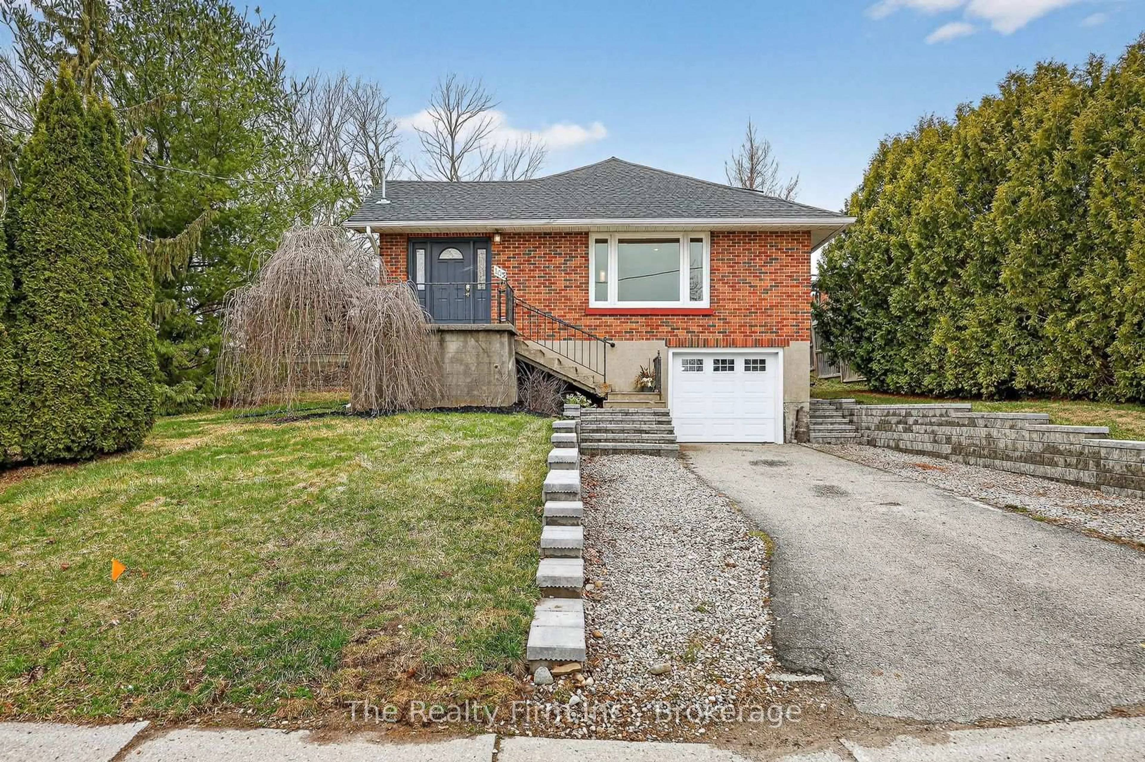 Home with brick exterior material, street for 105 King St, Ingersoll Ontario N5C 1G8
