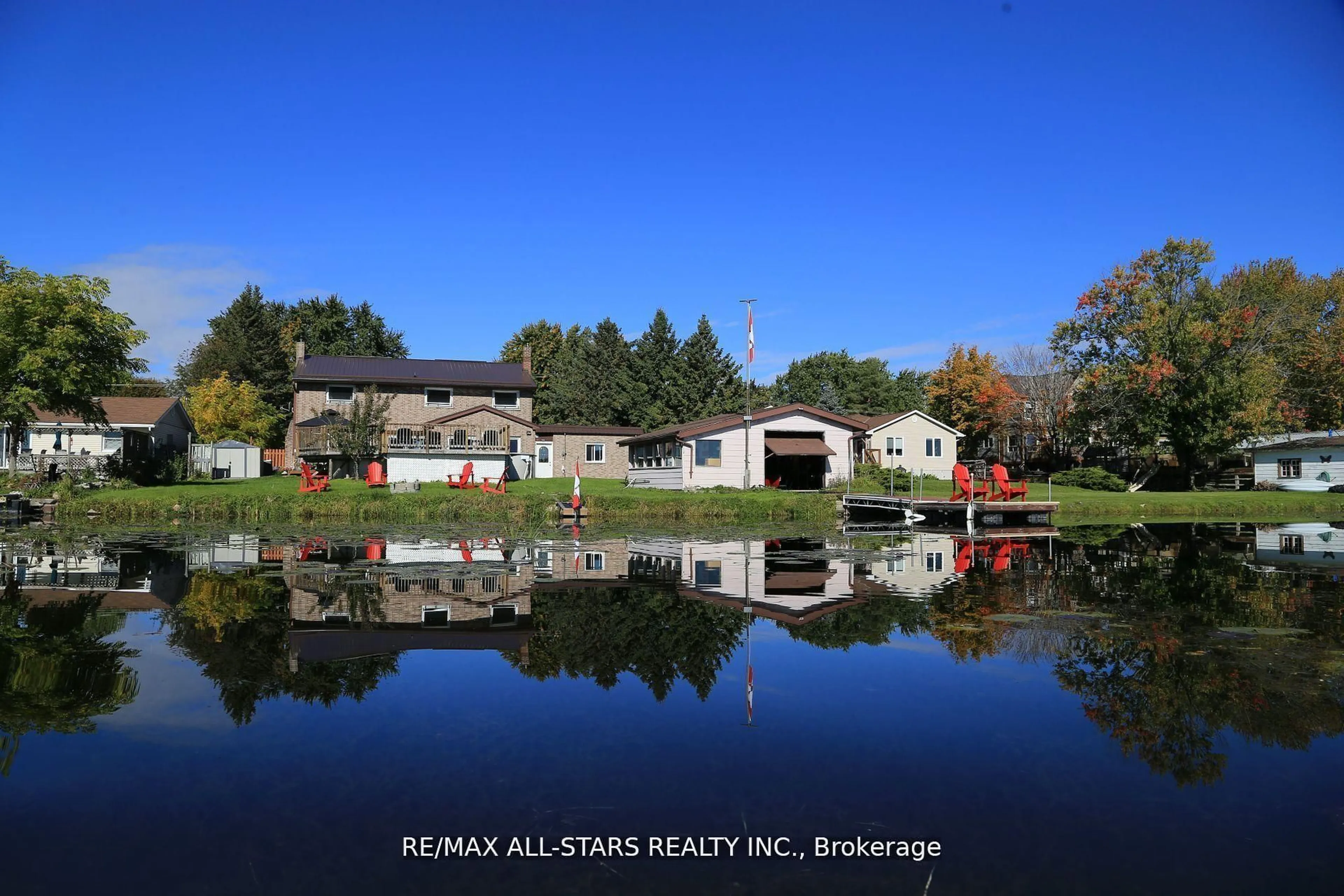 A pic from outside/outdoor area/front of a property/back of a property/a pic from drone, water/lake/river/ocean view for 122 Fenelon Dr, Kawartha Lakes Ontario K0M 1G0