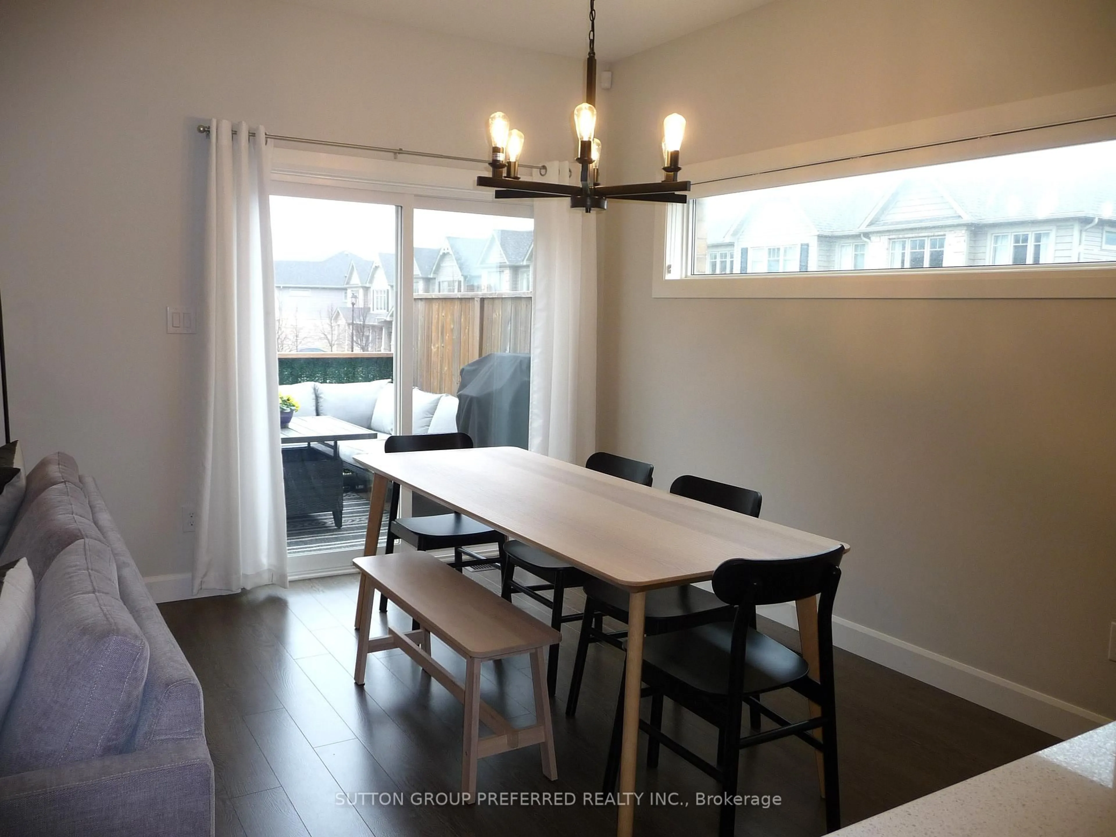 Dining room, wood/laminate floor for 600 Guiness Way #30, London North Ontario N5X 0N4
