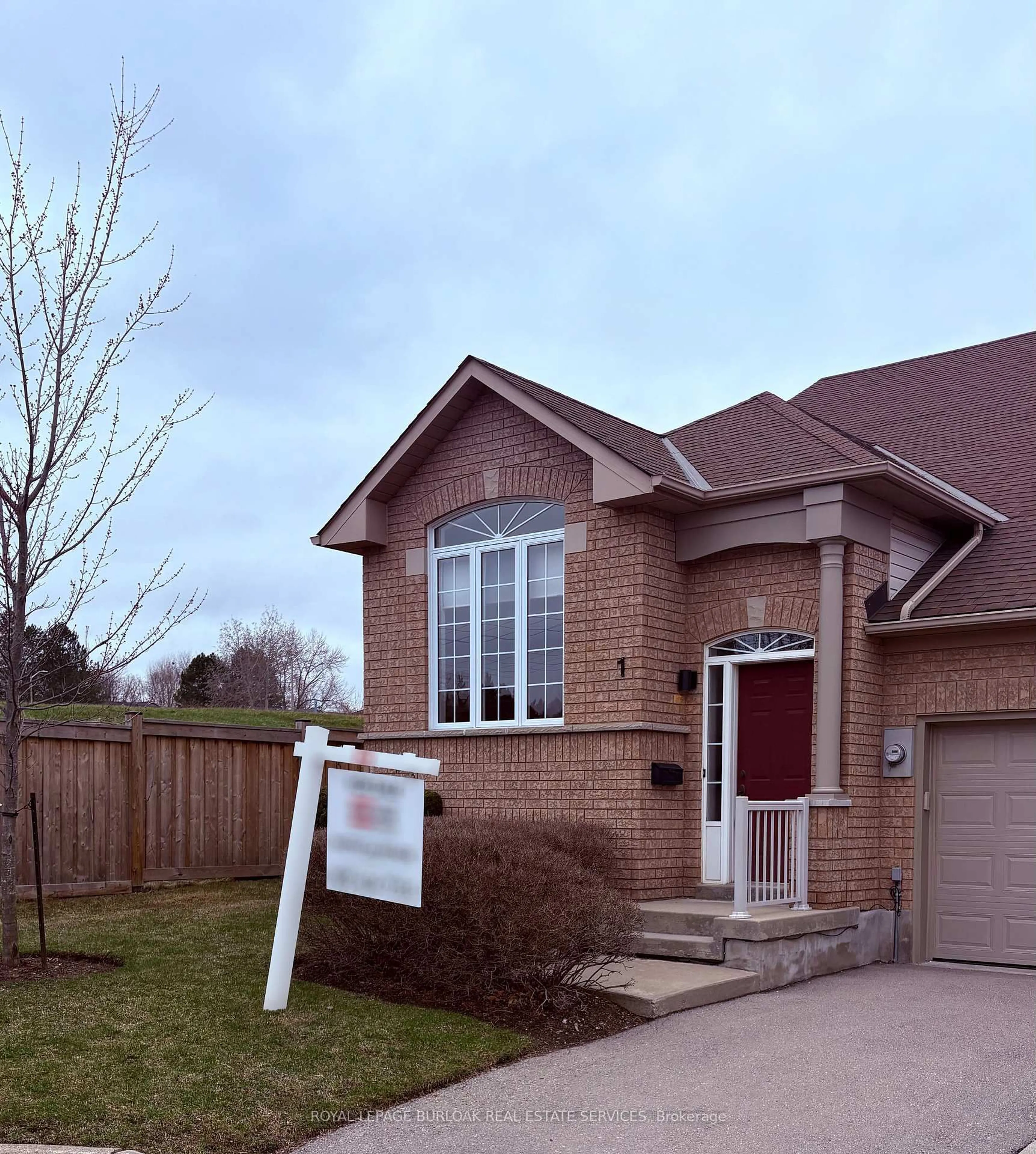 Home with brick exterior material, street for 10 Davidson Blvd #1, Hamilton Ontario L9H 7N9
