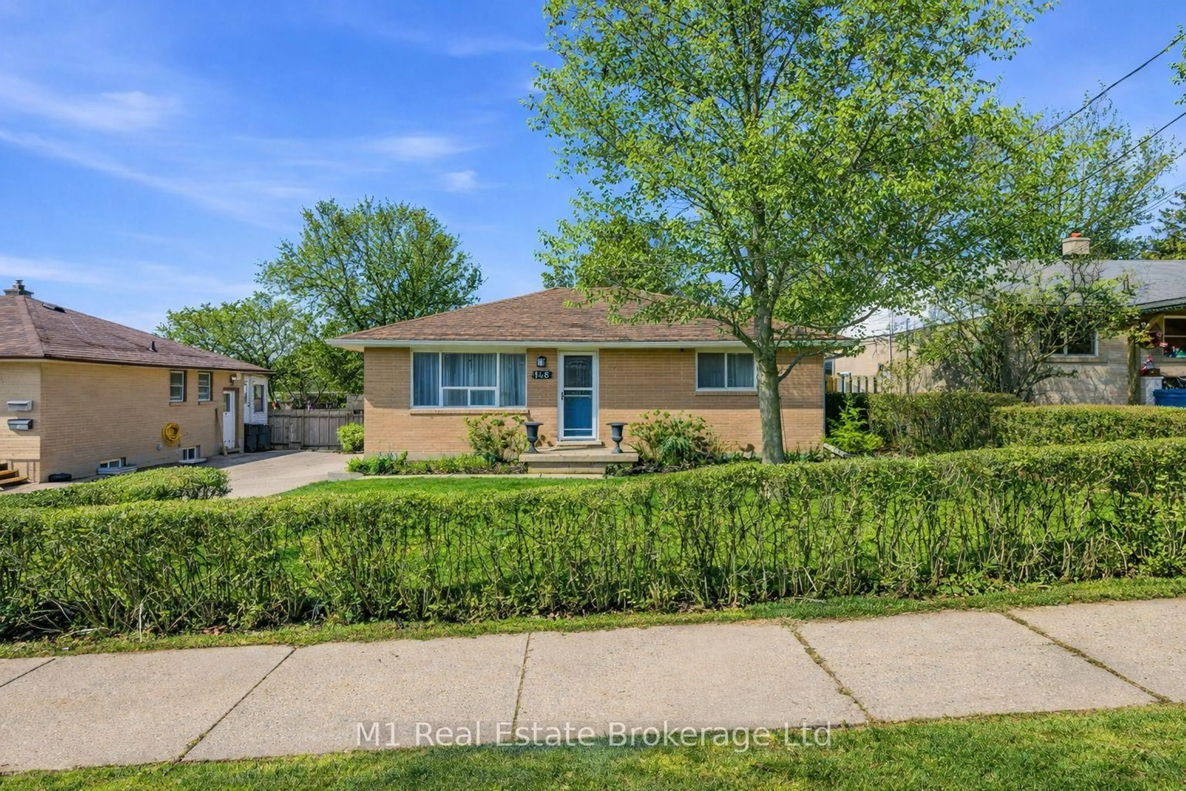 Home with brick exterior material, street for 148 Victoria Rd, Guelph Ontario N1E 5H5