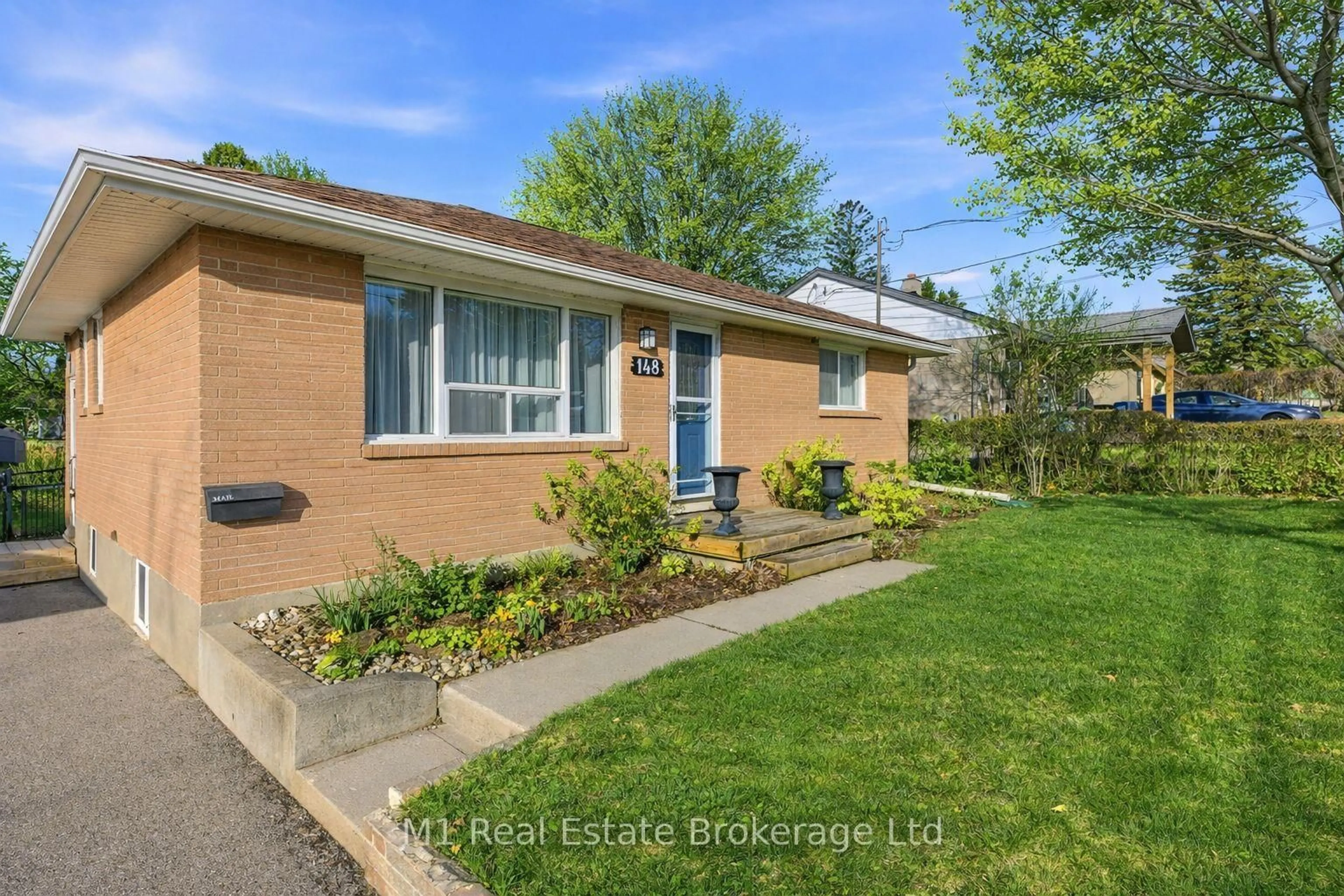 Home with brick exterior material, street for 148 Victoria Rd, Guelph Ontario N1E 5H5