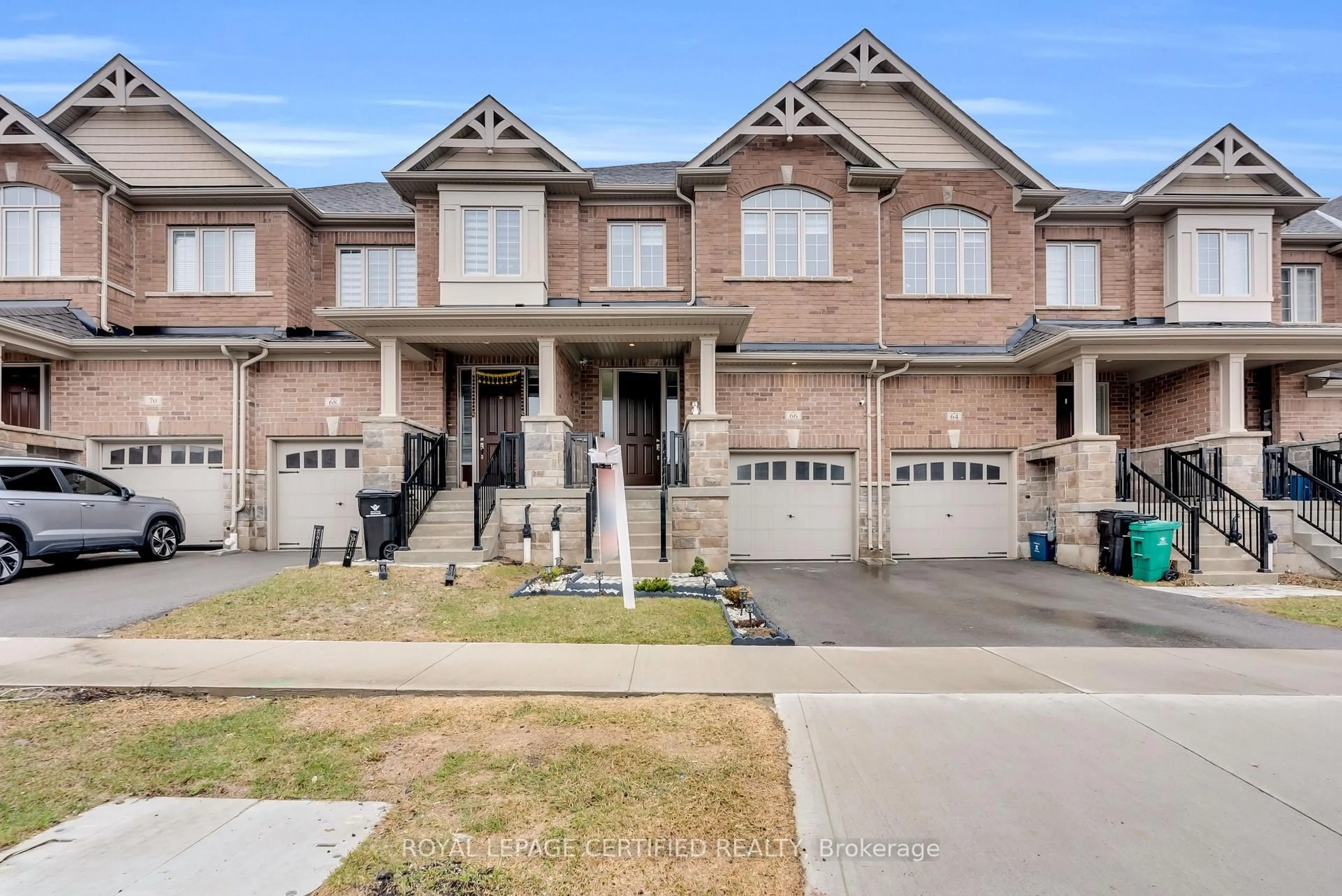 Home with brick exterior material, street for 66 Grassbourne Ave, Kitchener Ontario N2R 0S5