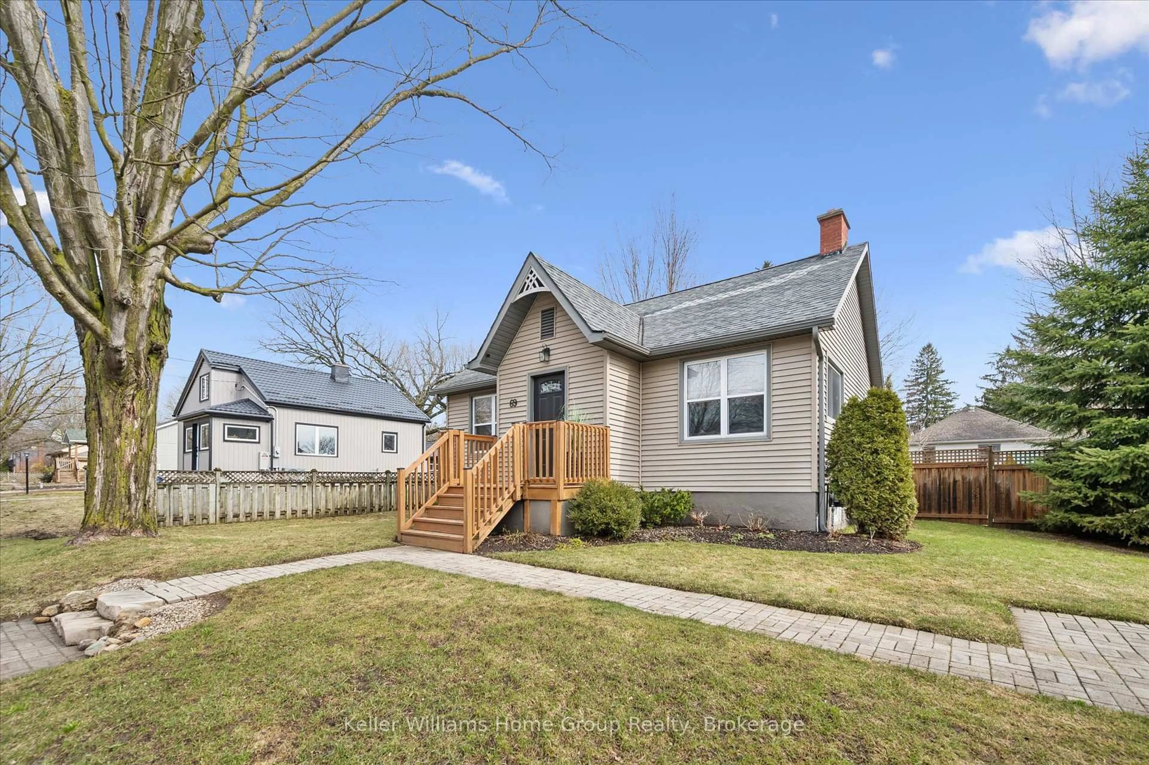 Home with vinyl exterior material, street for 69 Irvine St, Centre Wellington Ontario N0B 1S0