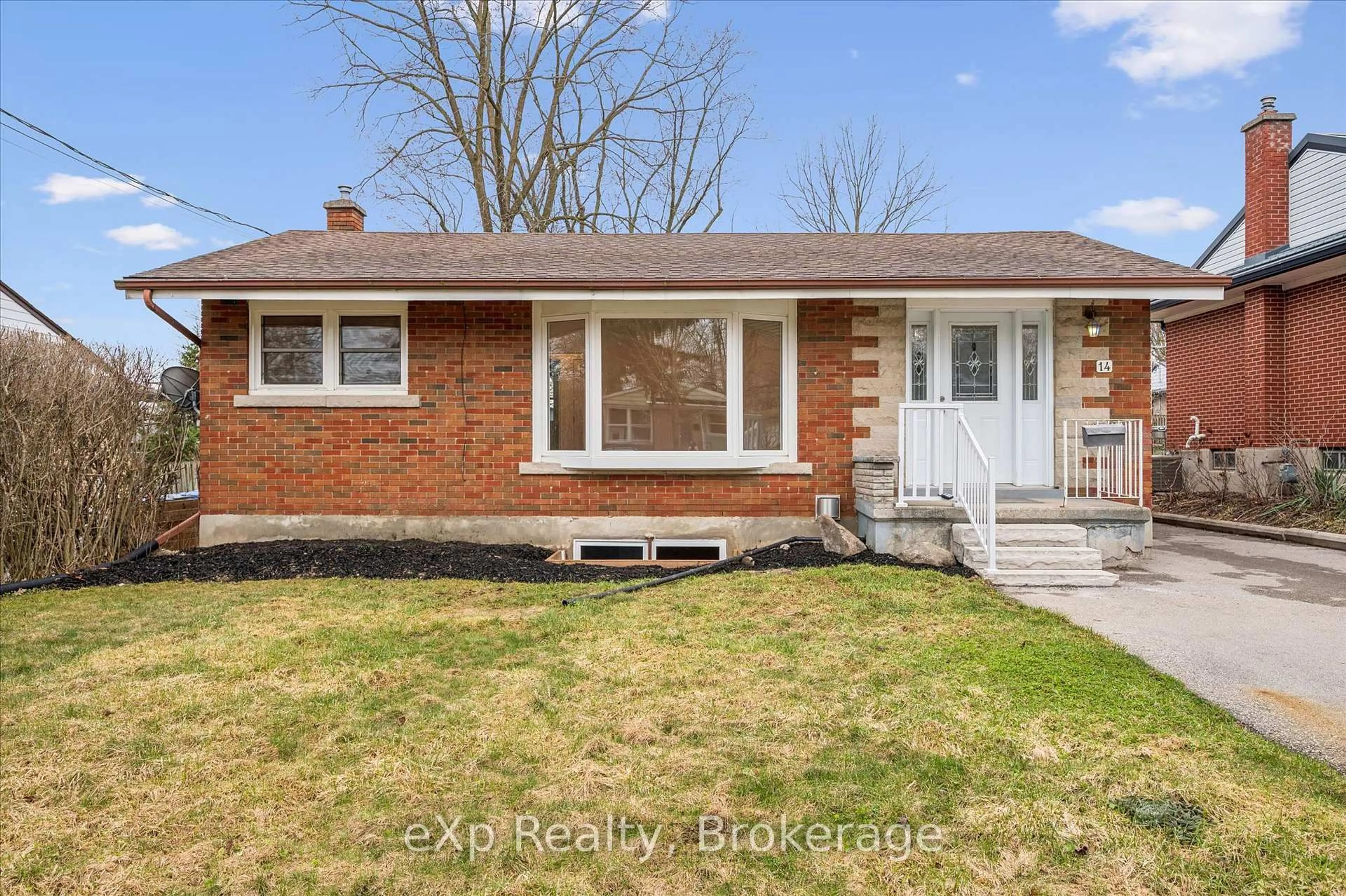 Home with brick exterior material, street for 14 Lincoln Cres, Guelph Ontario N1E 1Y8