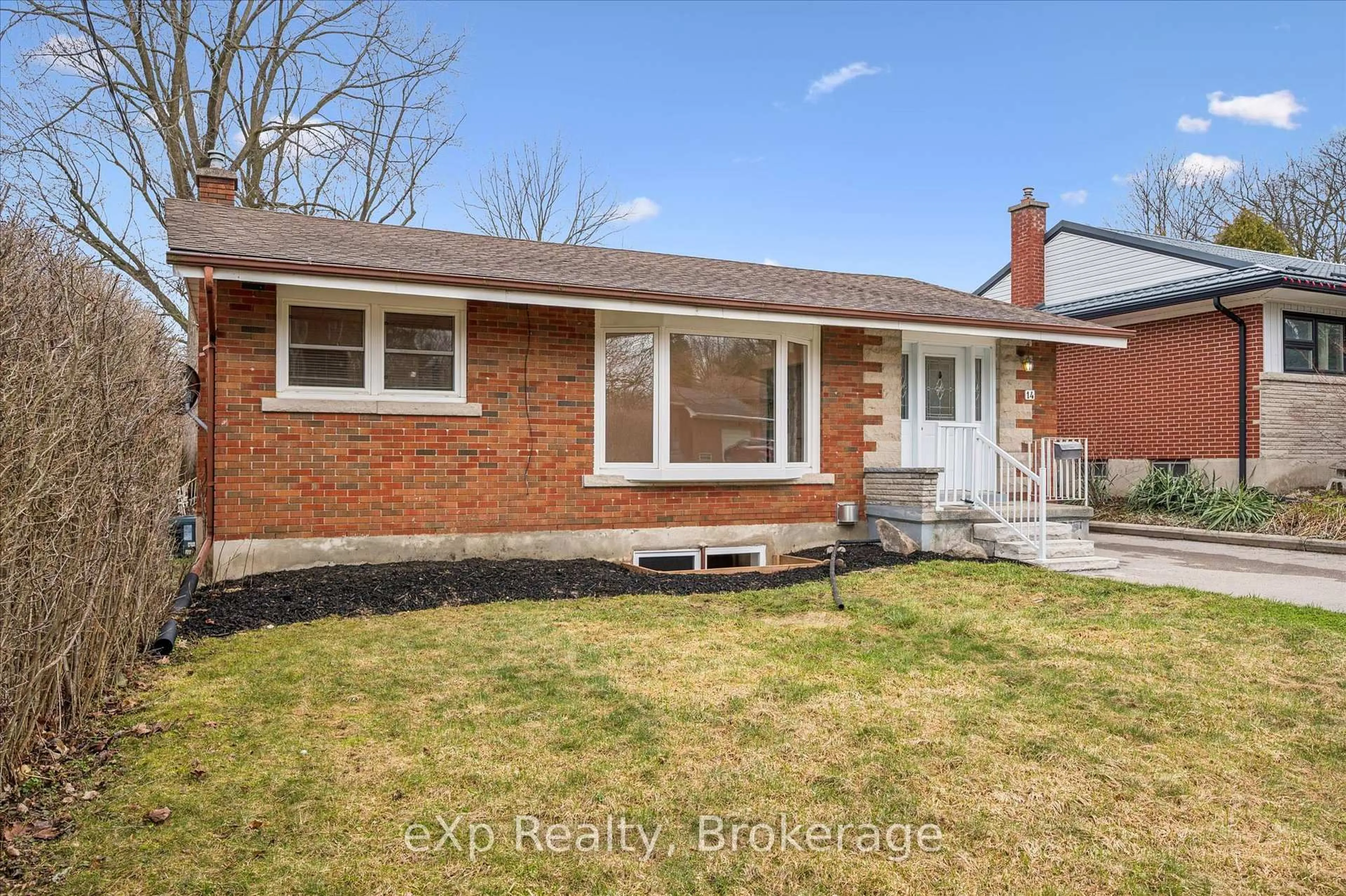 Home with brick exterior material, street for 14 Lincoln Cres, Guelph Ontario N1E 1Y8
