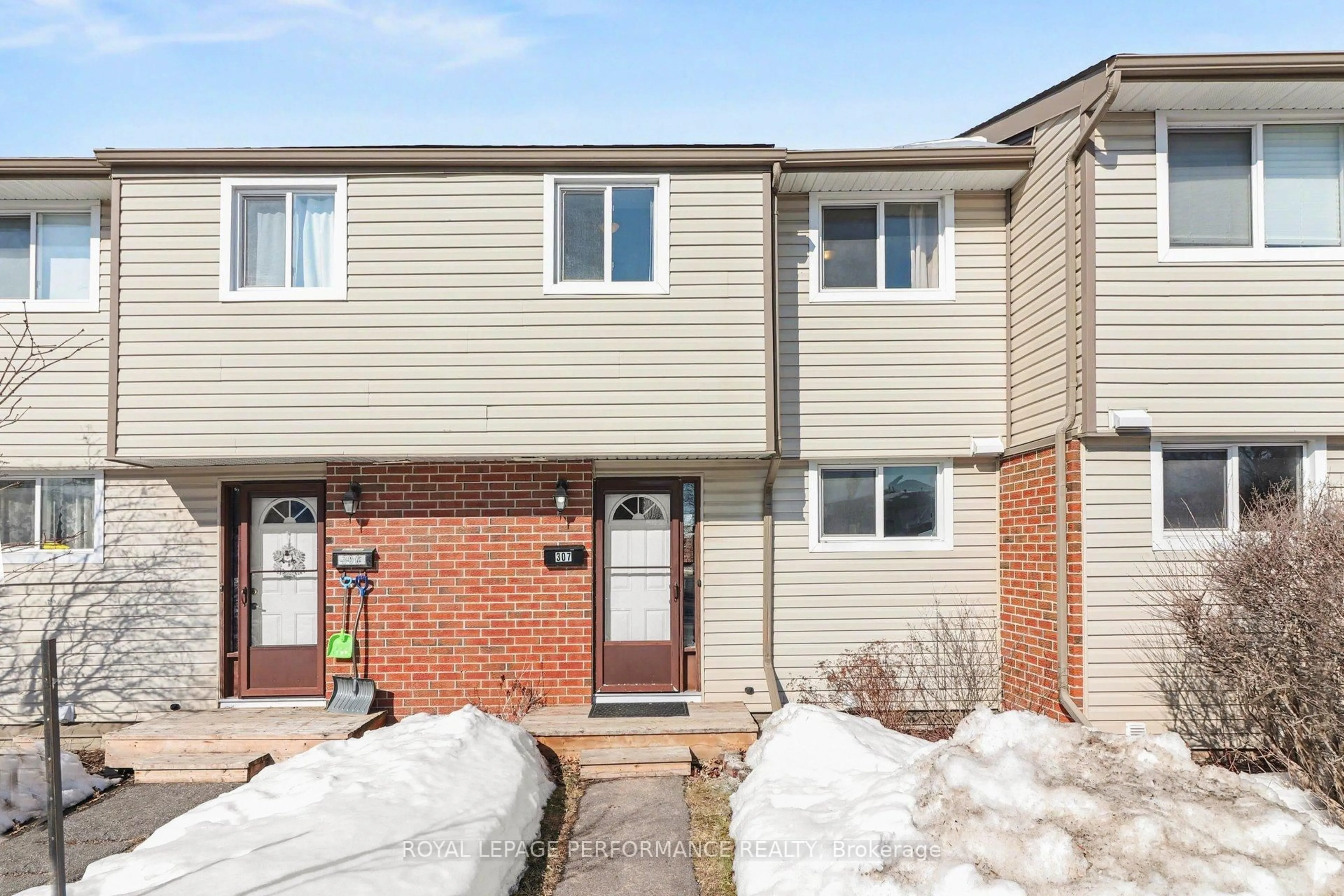 Home with brick exterior material, street for 1441 Palmerston Dr #307, Ottawa Ontario K1J 8N9