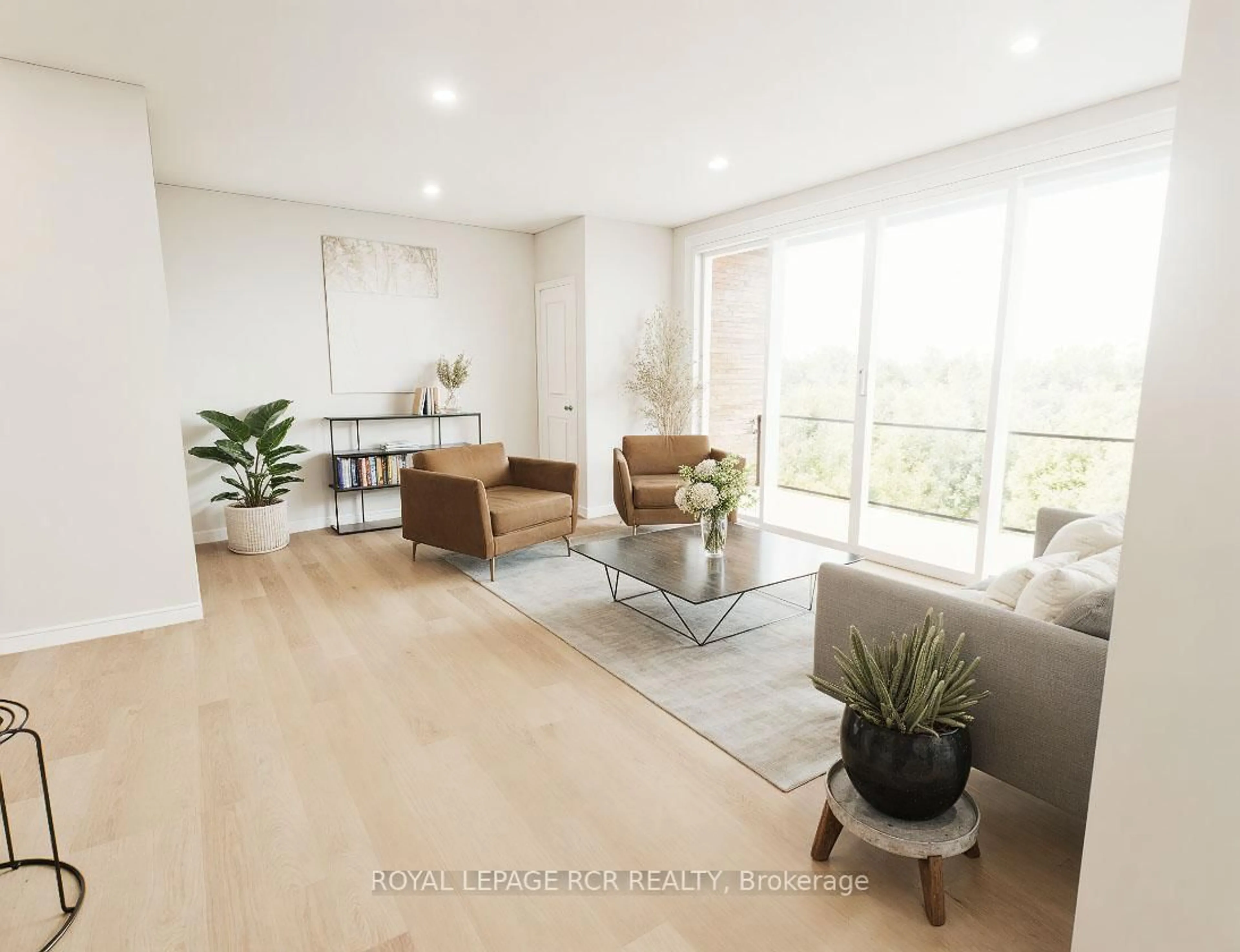 Living room with furniture, wood/laminate floor for 50 Emma St #402, East Luther Grand Valley Ontario L9W 5P9