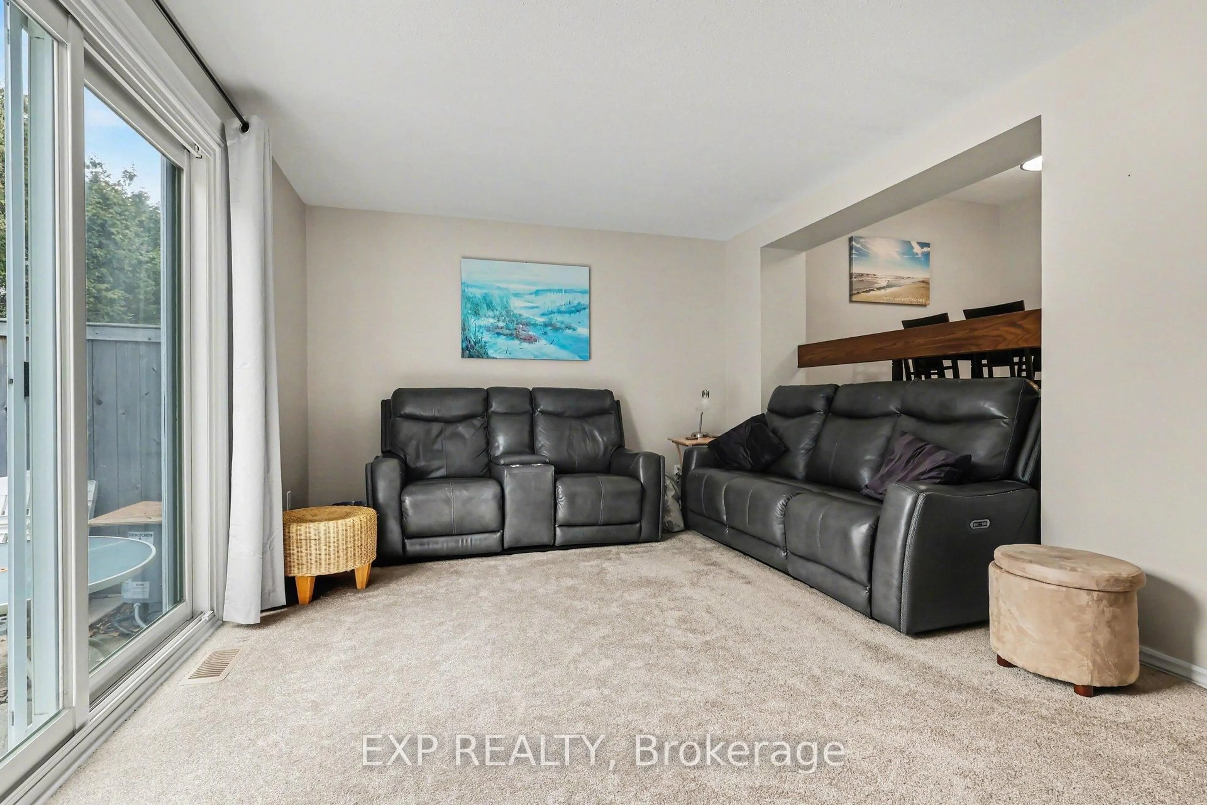 Living room with furniture, unknown for 1765 Lamoureux Dr #55, Ottawa Ontario K1E 2N5