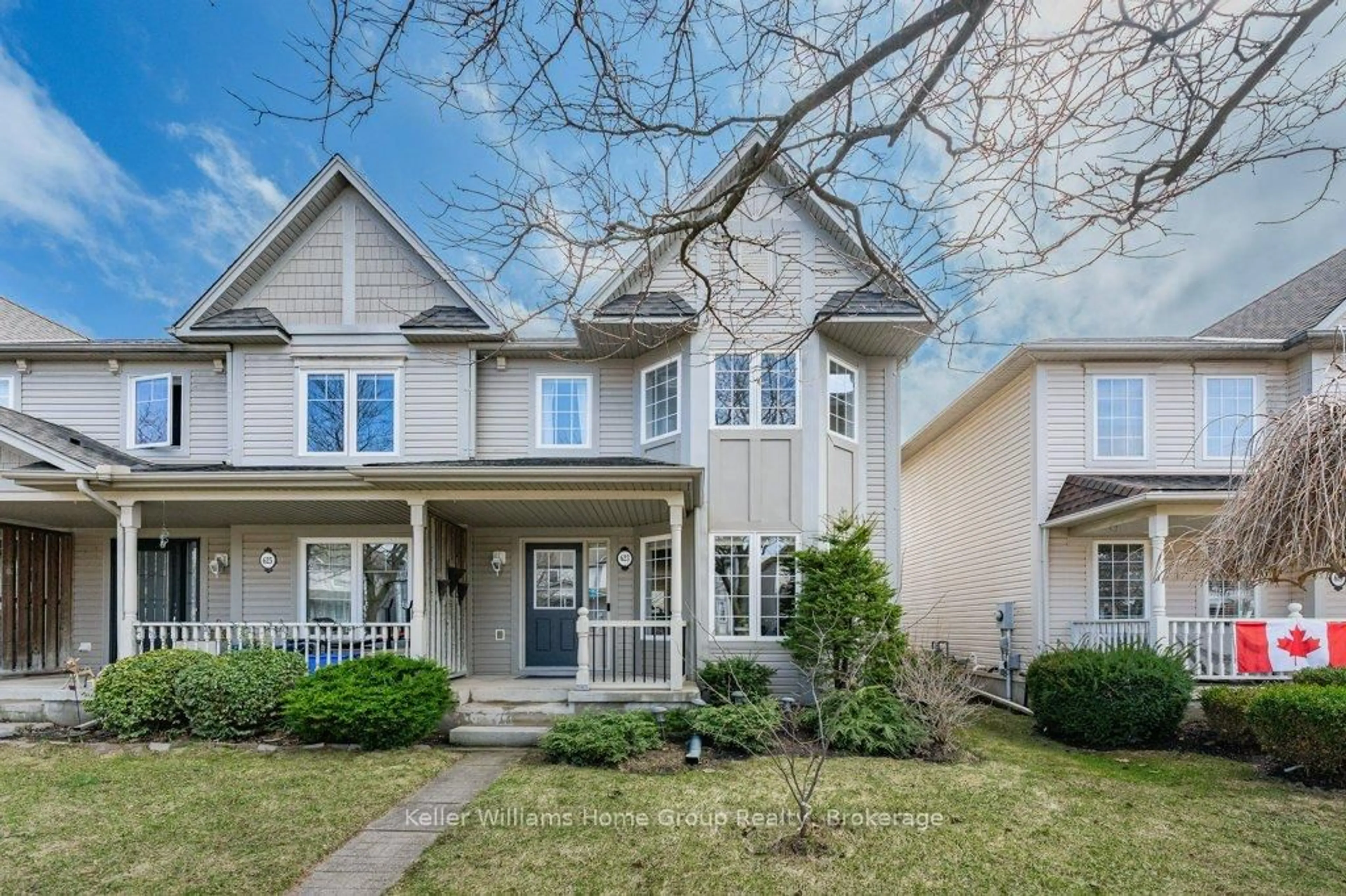 Home with vinyl exterior material, street for 623 New Bedford Dr, Waterloo Ontario N2K 4C4