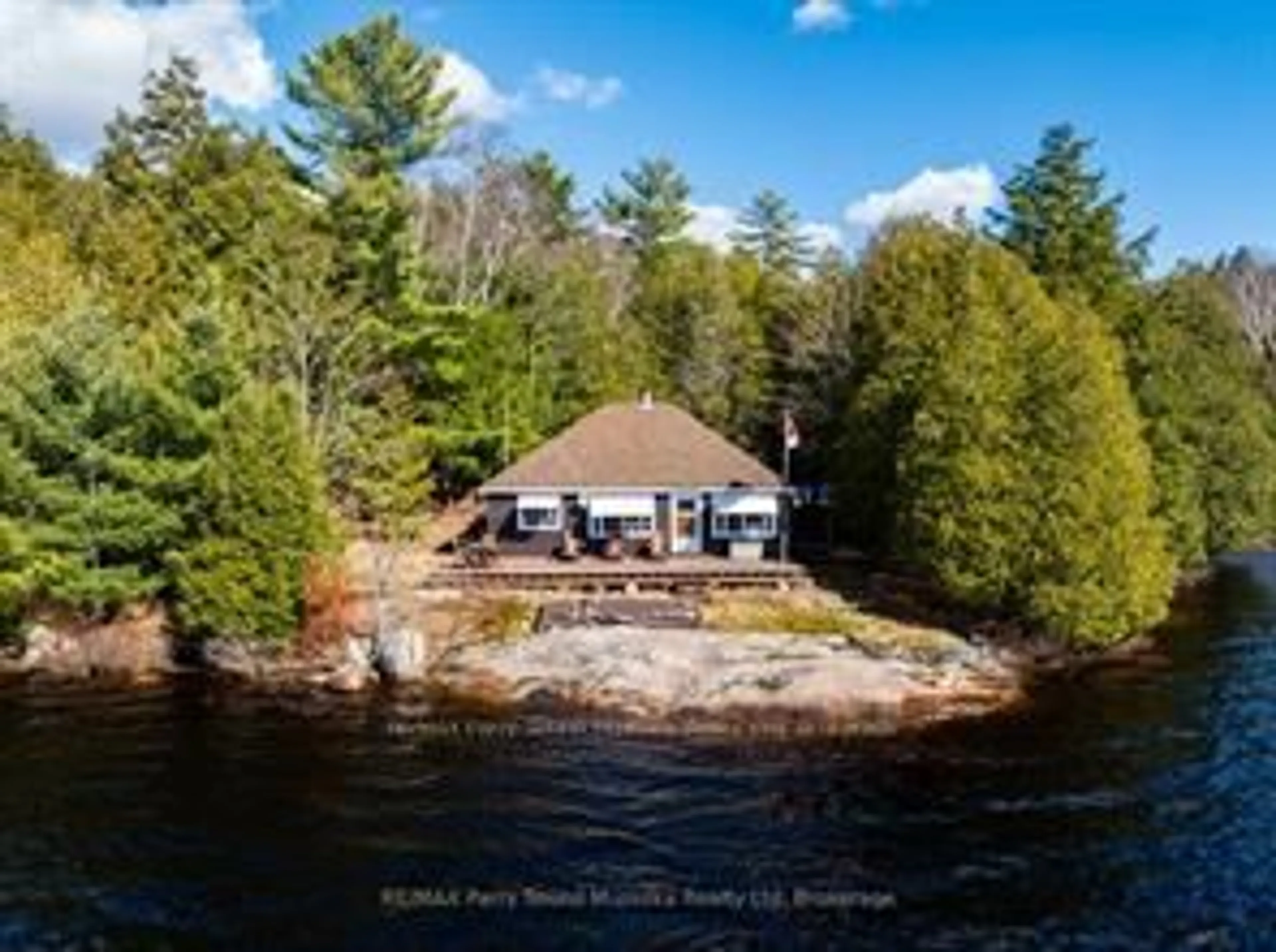 A pic from outside/outdoor area/front of a property/back of a property/a pic from drone, water/lake/river/ocean view for 764 EAST BEAR LAKE Rd, McMurrich/Monteith Ontario P0A 1Y0