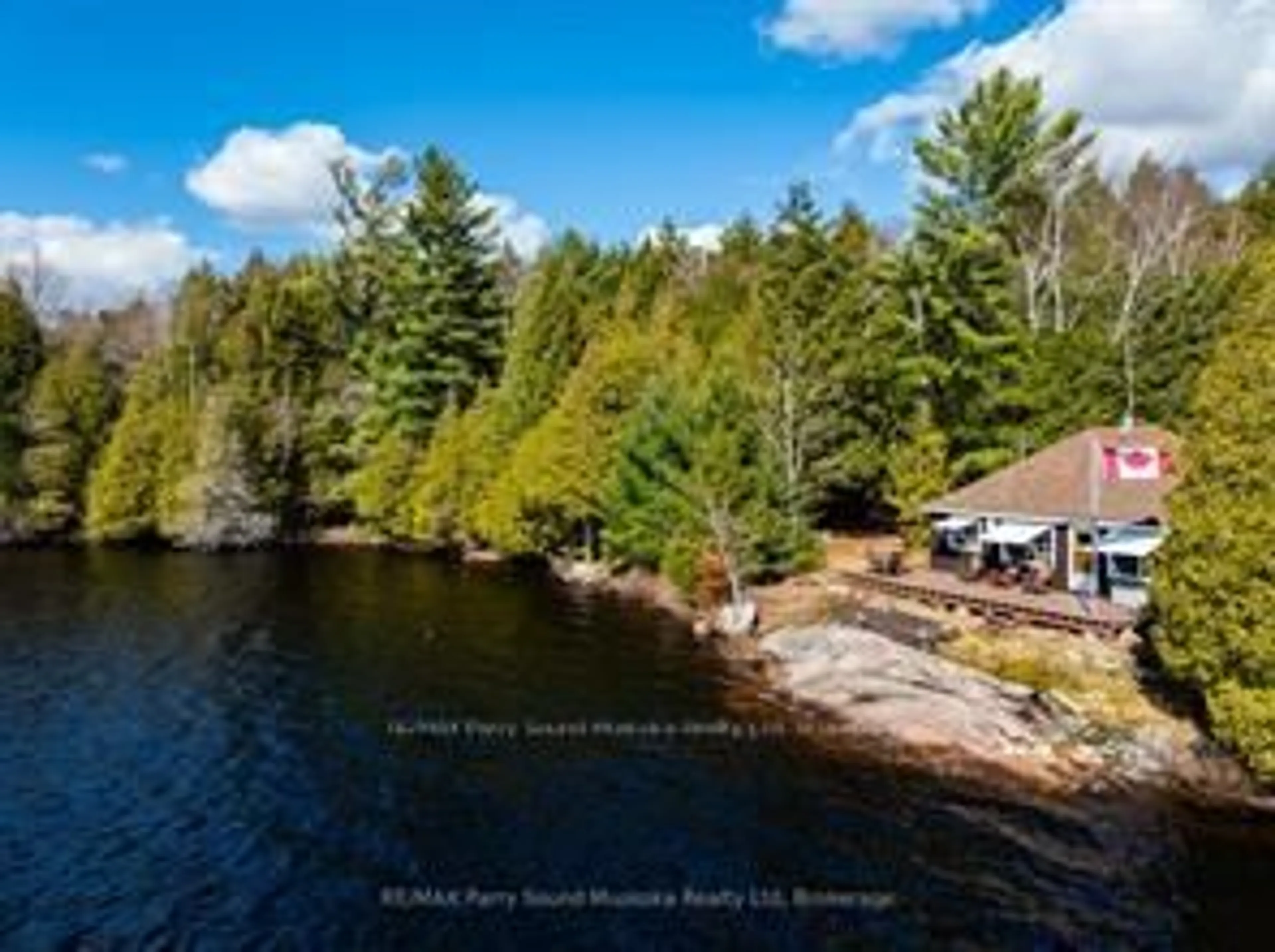 A pic from outside/outdoor area/front of a property/back of a property/a pic from drone, water/lake/river/ocean view for 764 EAST BEAR LAKE Rd, McMurrich/Monteith Ontario P0A 1Y0