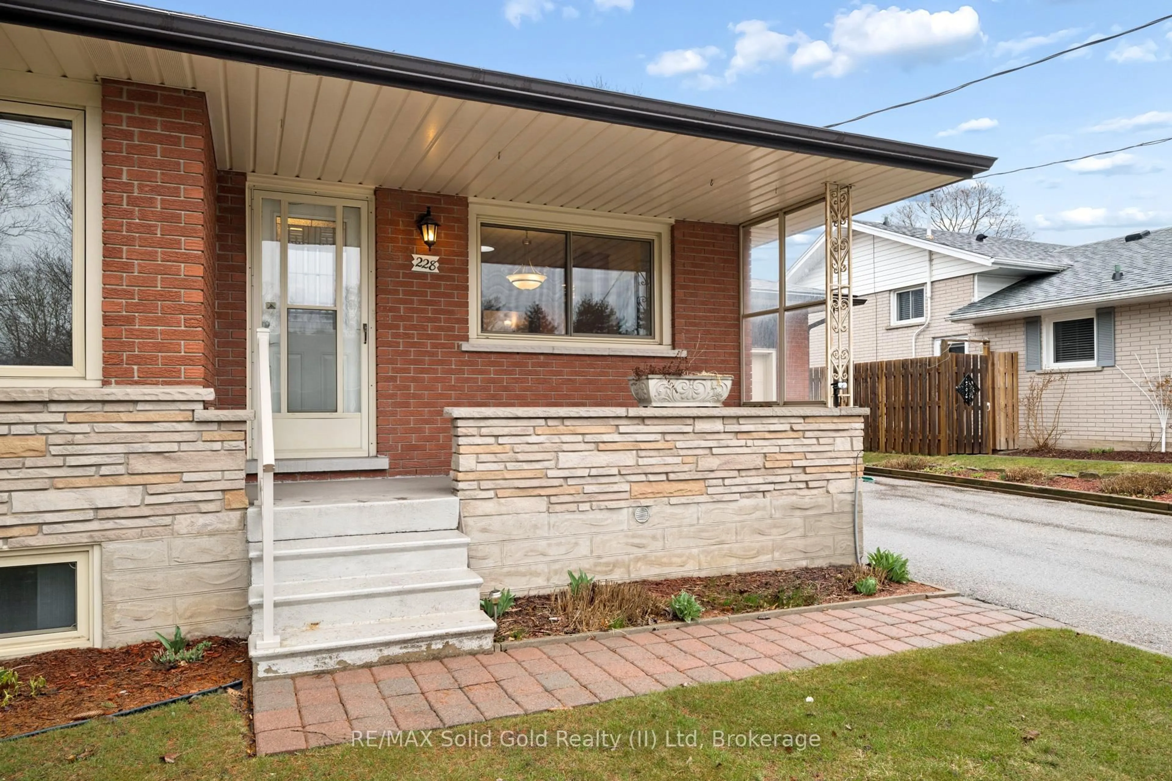 Home with brick exterior material, street for 228 Kenneth Ave, Kitchener Ontario N2A 1W4